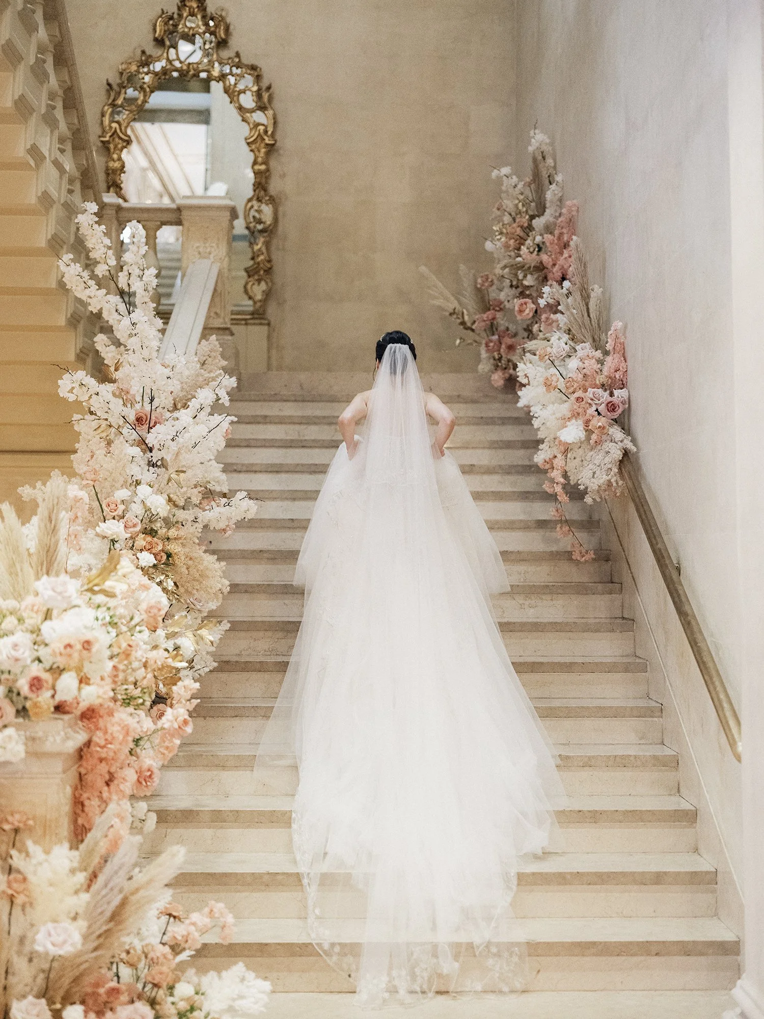 Editorial bridal portrait on a grand staircase