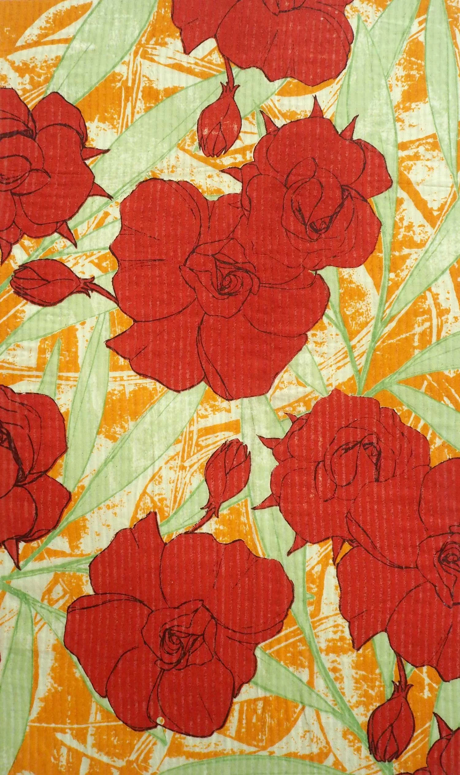 Patterned fabric with red roses on orange and green background