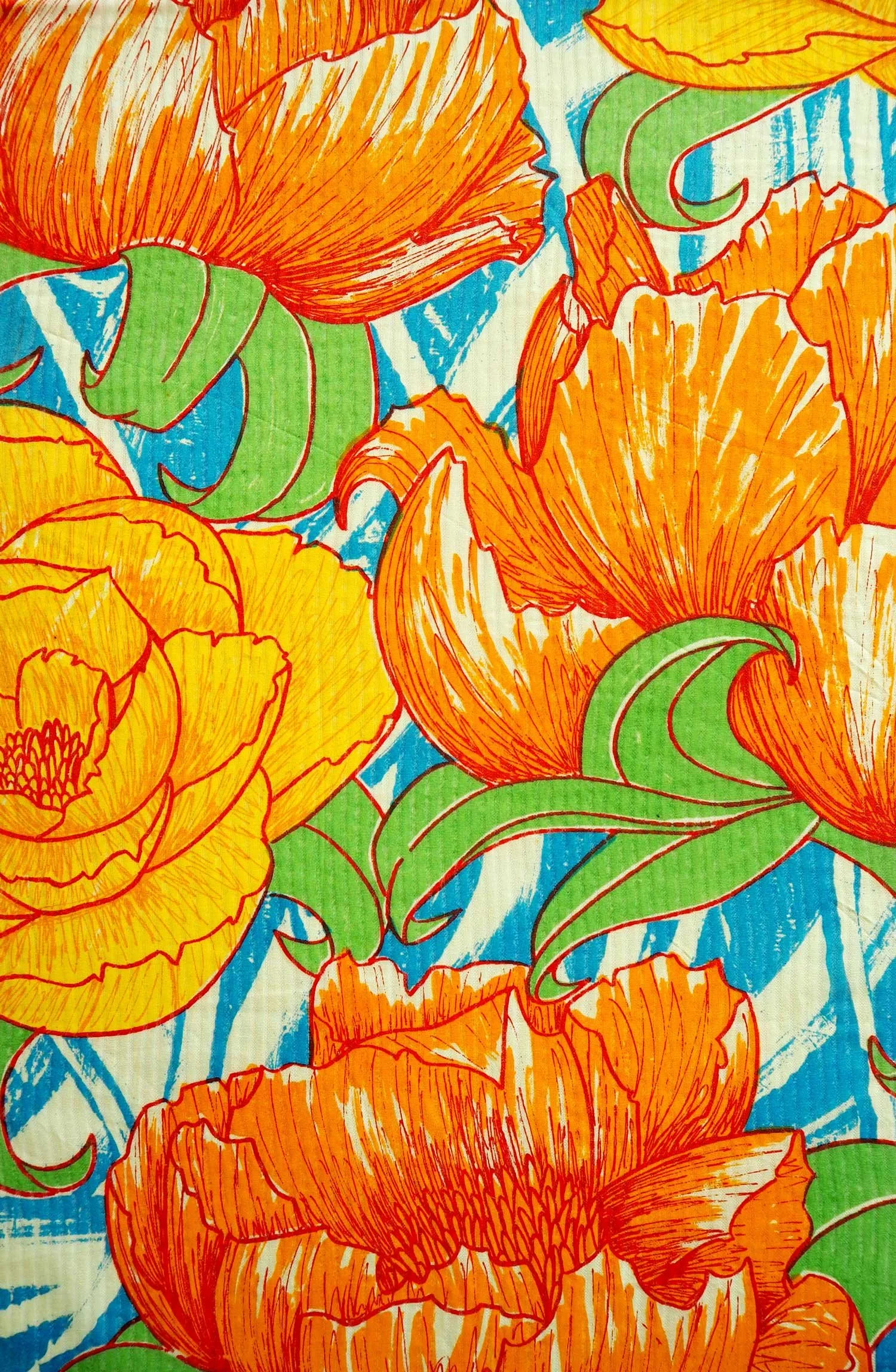 Colorful floral pattern with orange and yellow flowers, green leaves, and a blue background.
