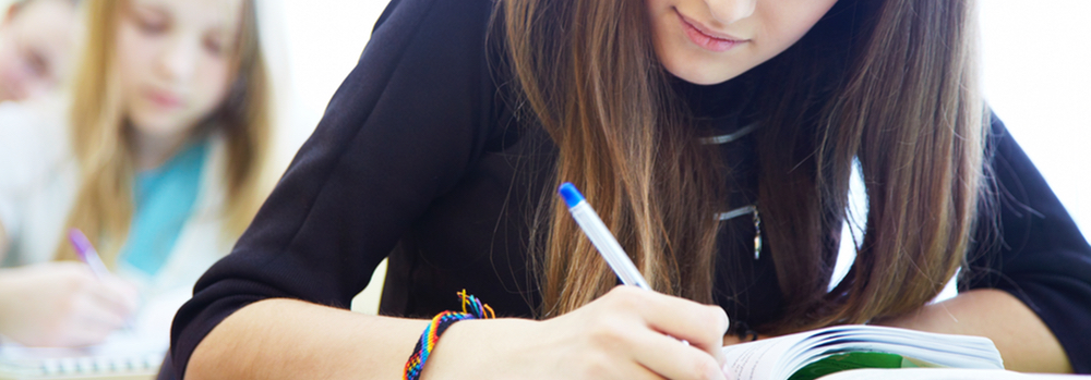 Girl Taking Test – What's New on the Redesigned SAT?