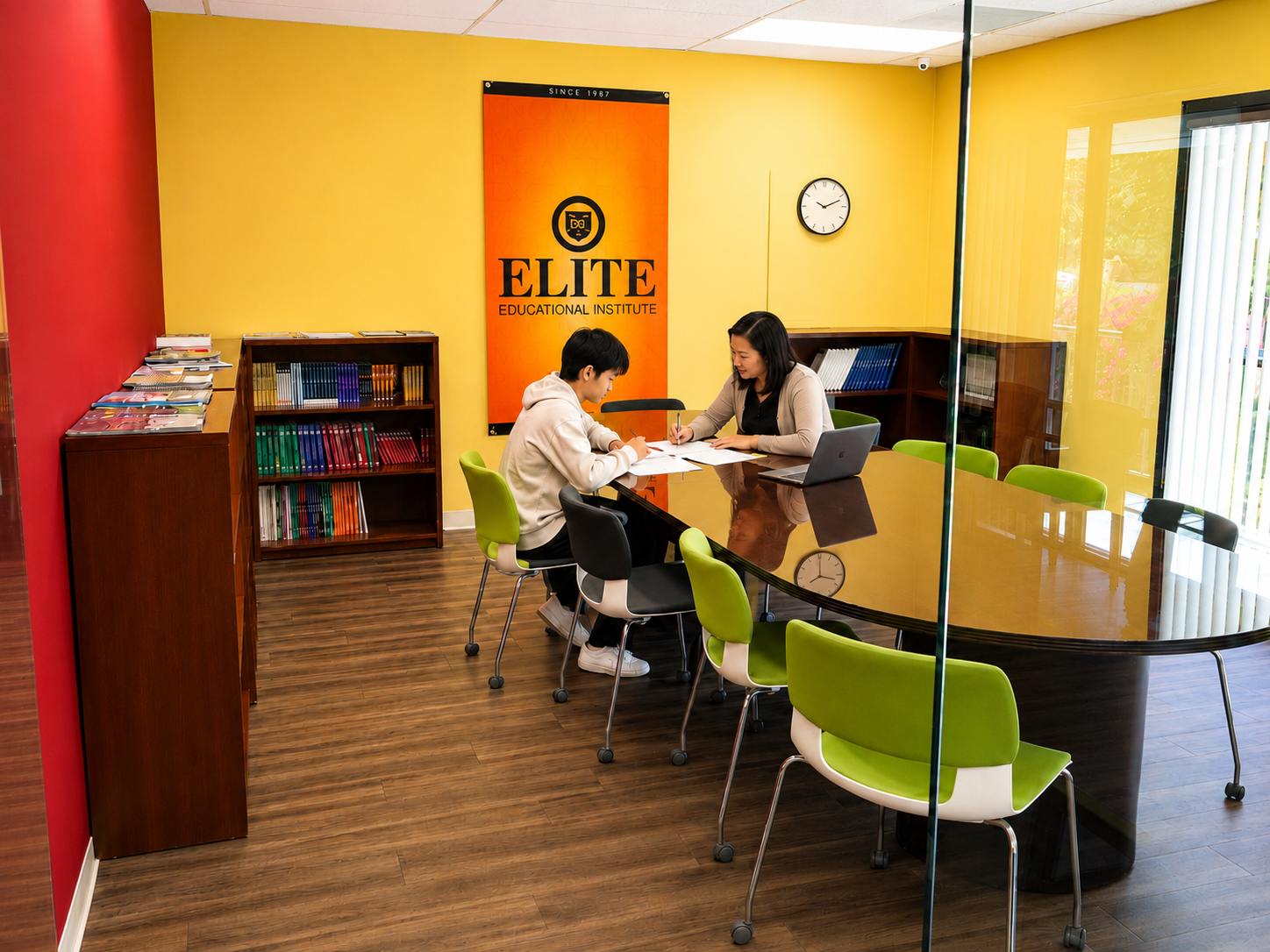 Elite Prep Learning Hub student and tutor in conference room