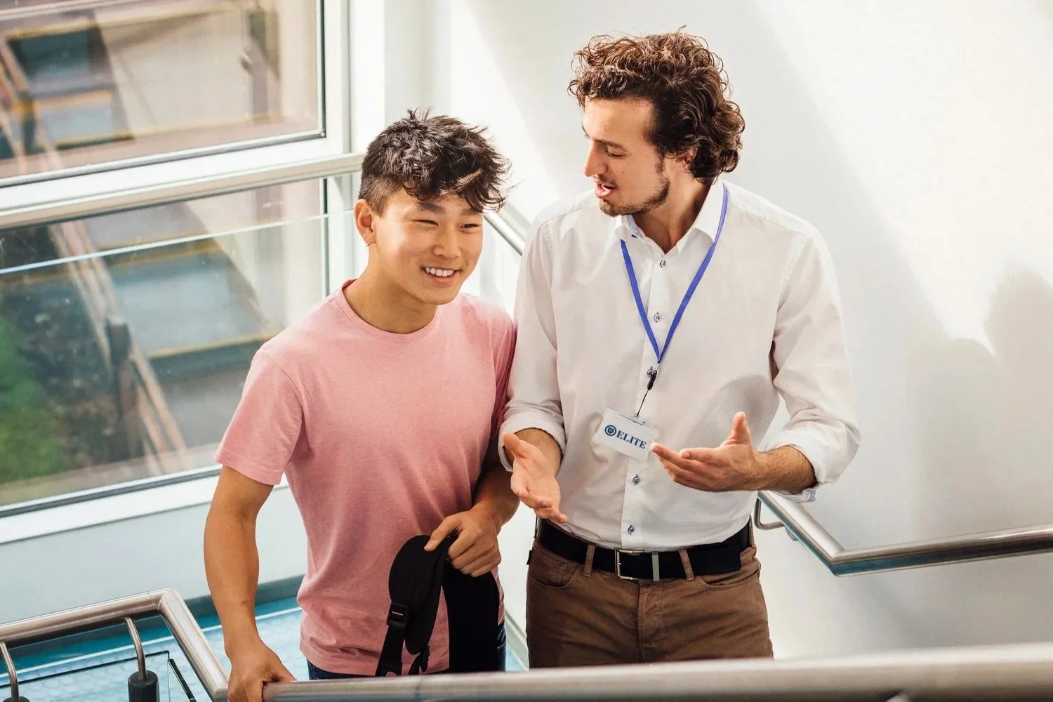 Elite Prep tutor walking with student
