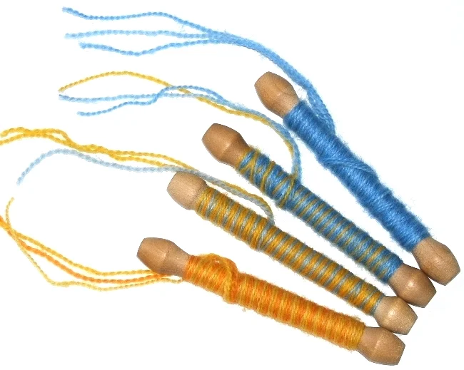 Four sequential color blends on Aubusson bobbins