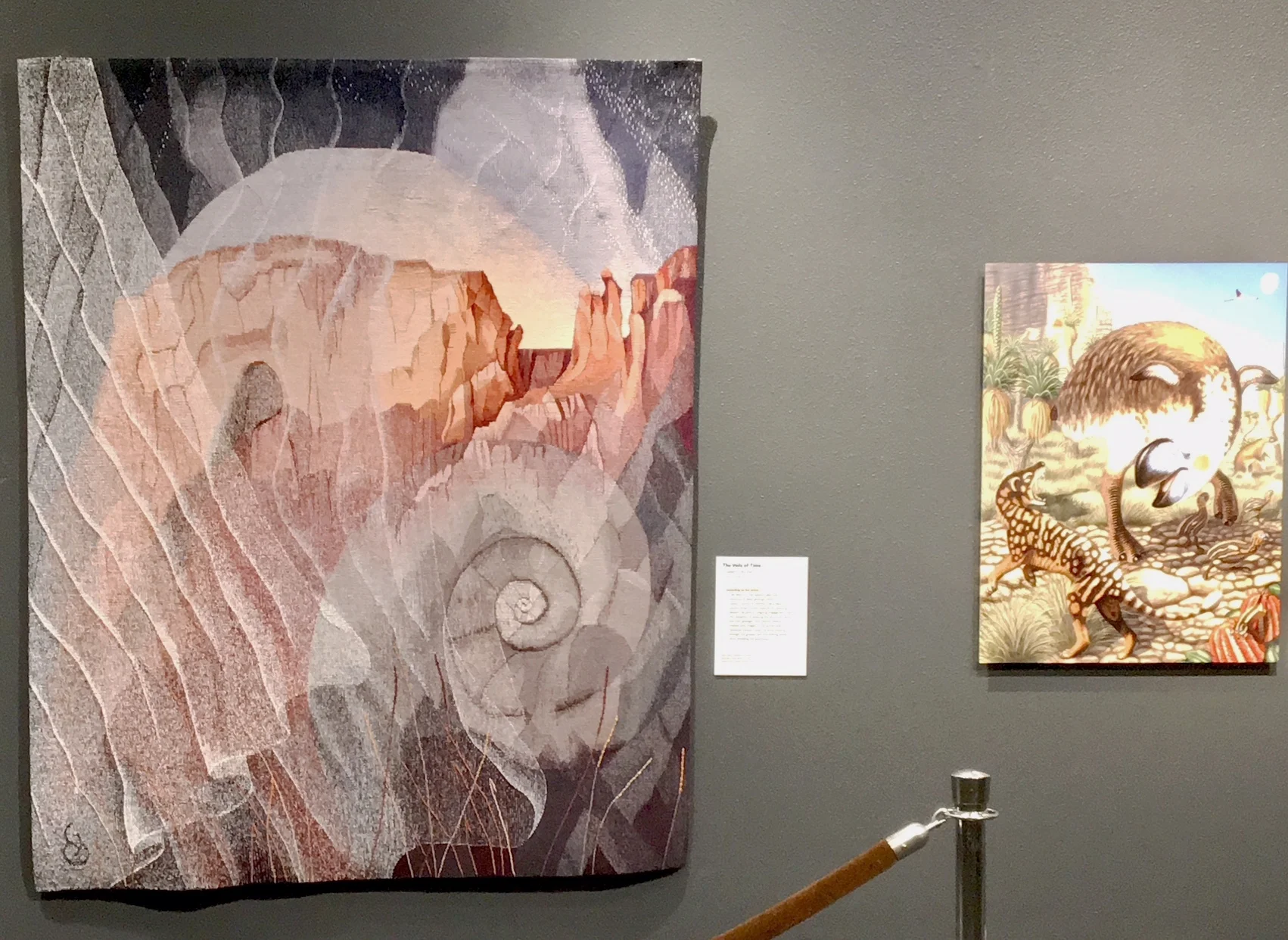 The Veils of Time tapestry beside digital art.