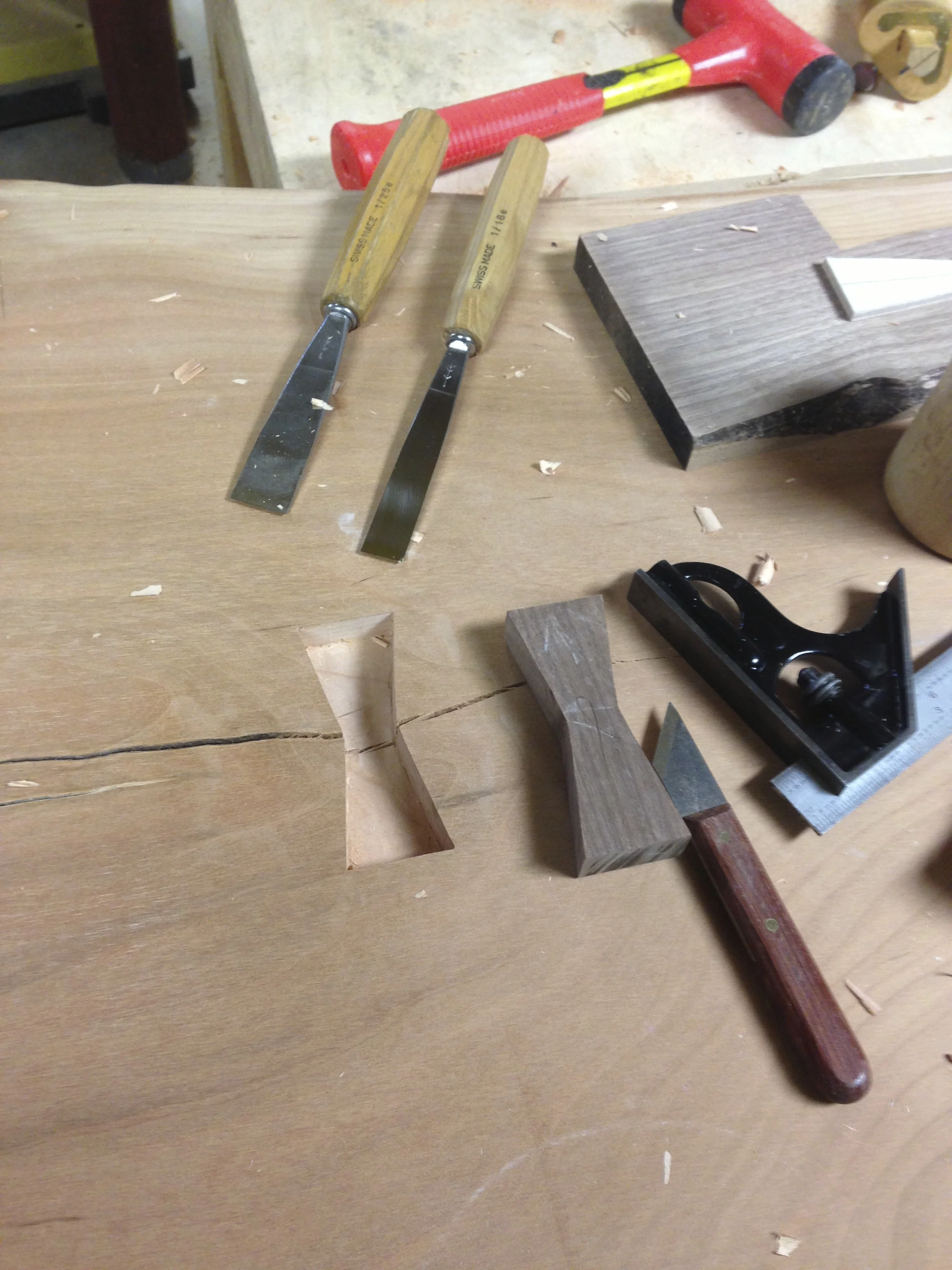 Inlay of butterfly key to prevent slab from splitting further