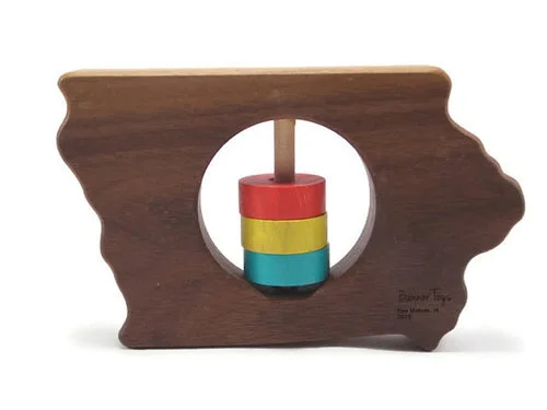 Wood teether/rattle : We received a wooden Iowa teether as a gift before Rooney was born and it was so sweet and thoughful! I love that wood toys are safe and organic for babies. The kind folks from Bannor Toys (who we met at our local farmers' market, as all their toys are made here in Des Moines, Iowa) sent Rooney a personalized wooden car and phone that she loves!