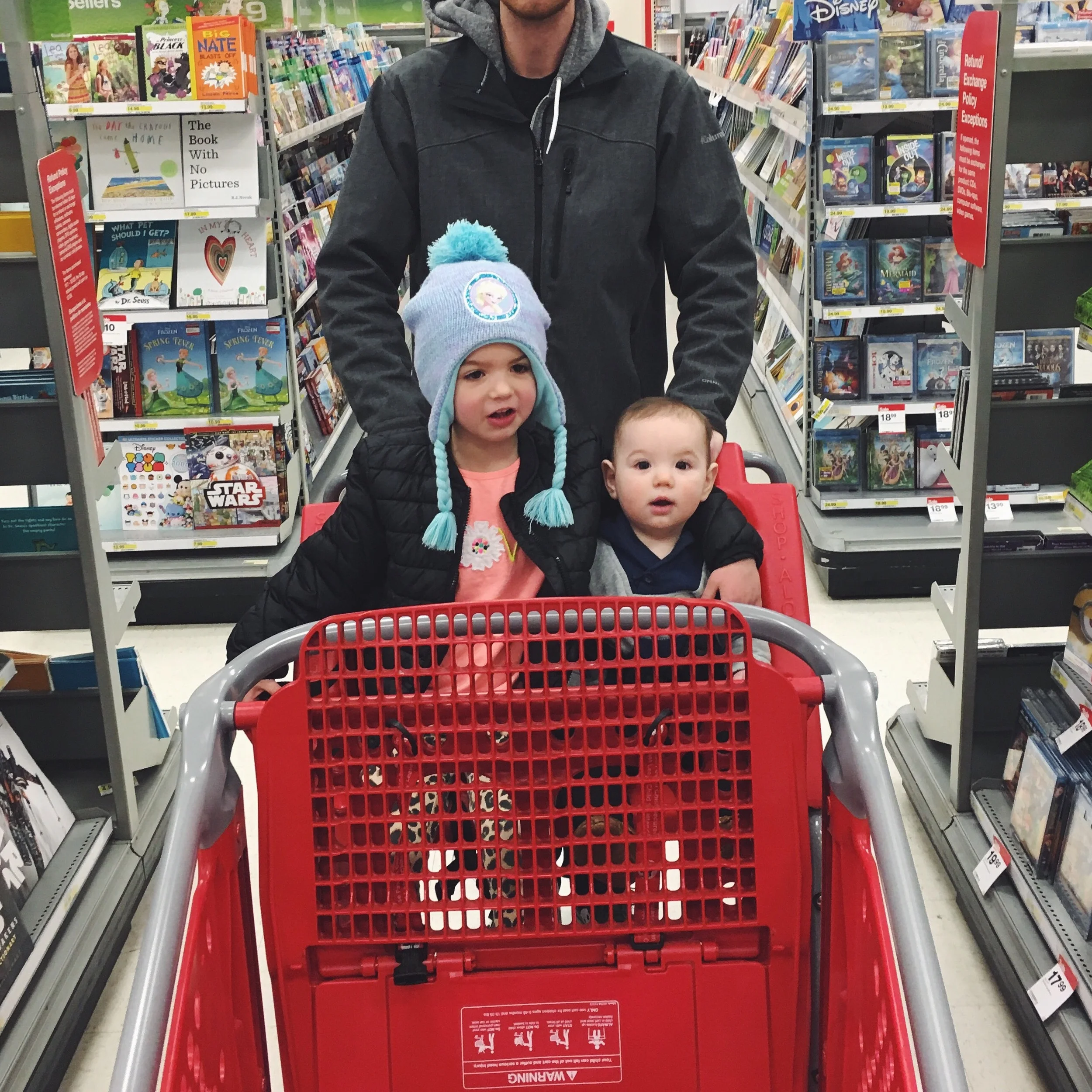 She's been waiting for Finchy to be big enough to ride in shopping carts with her...she was so excited, she put her arm around him!!!