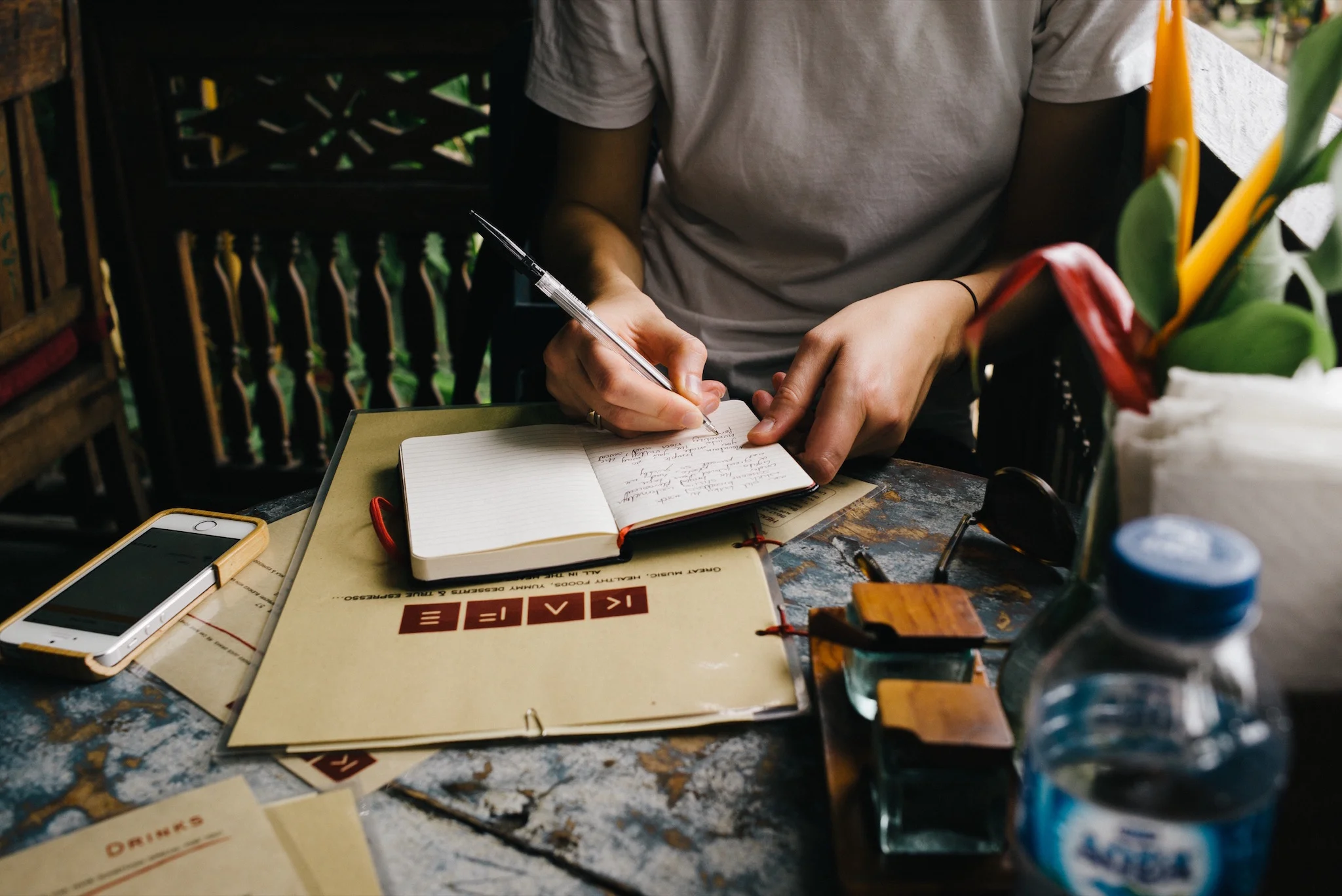 Hannah writing notes whilst I read at Kafe, Ubud.