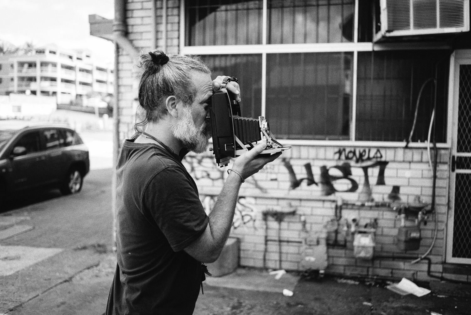  Simon making a 5x4 black and white portrait of Zoe on his Polaroid Razzle conversion. 