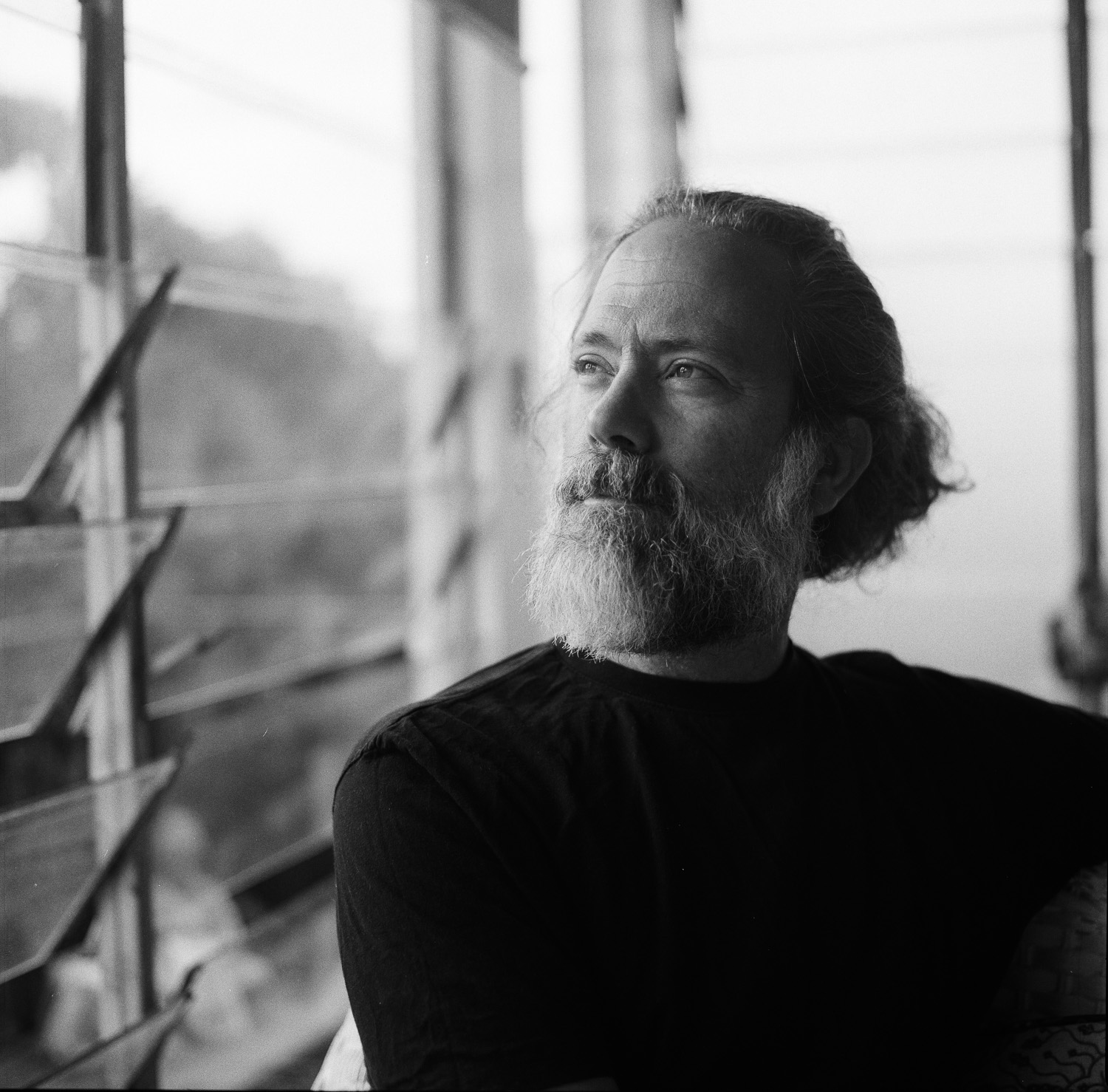 Got a roll of Ilford HP5 I shot on Rocky's Hasselblad back. Simon at home.