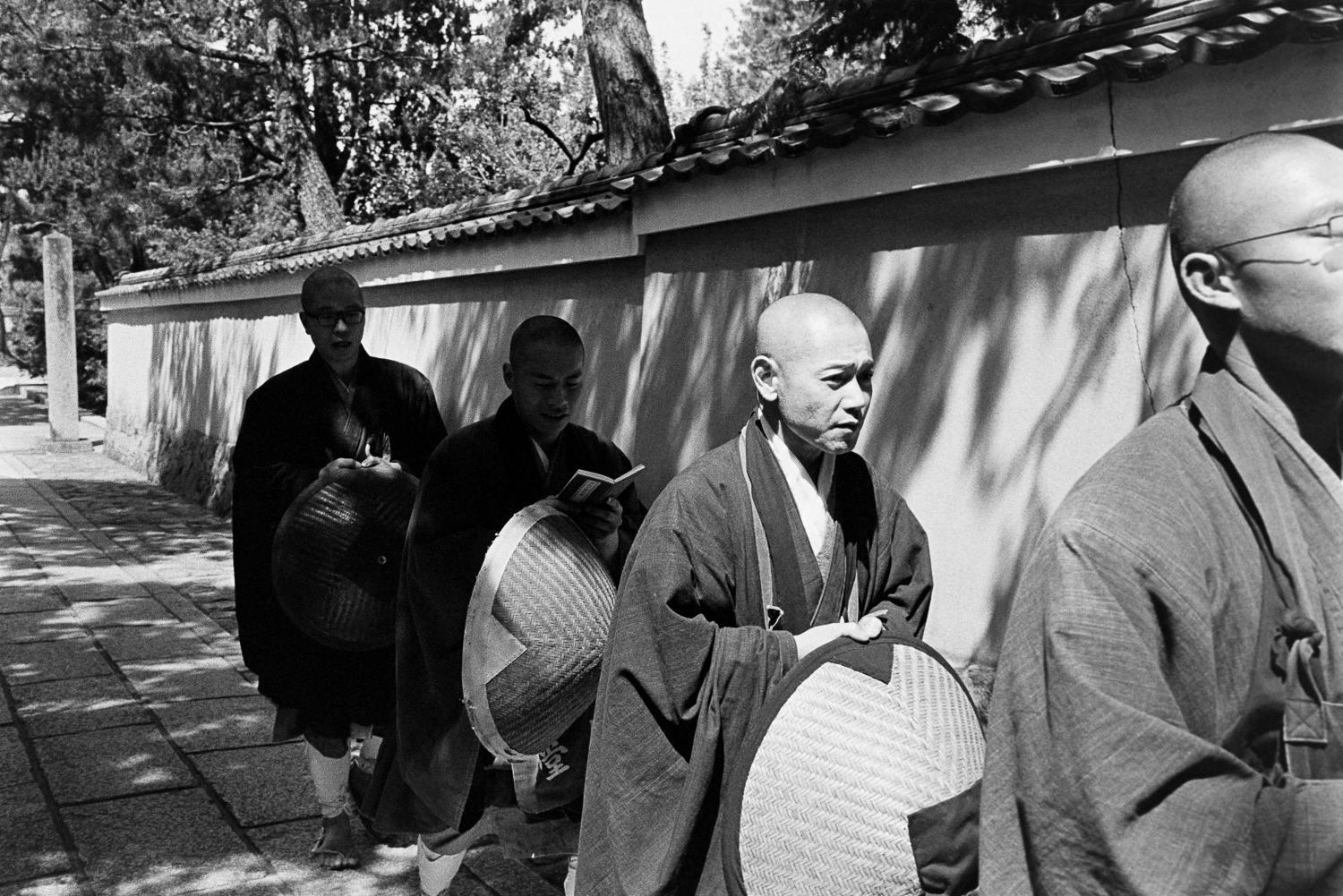  A group of Buddhist monks, I think, walked past me chanting in unison. 