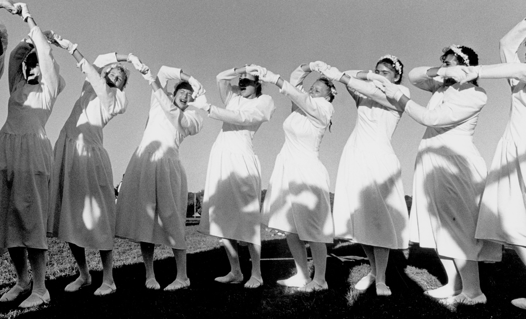 The Forest Park Ranger Marching Band in Ferdinand was perennially one of the best in Indiana. Before competitions, the flag corp went through a team building ritual. The image was part of a photo story on their entire season, from first practice unt…