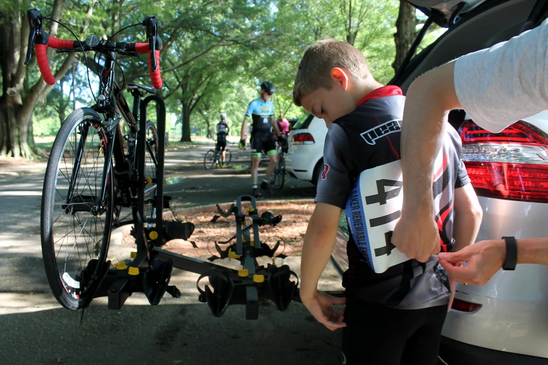 Koa Kaliebe, 12, readies for the junior race with his father, Kurt.