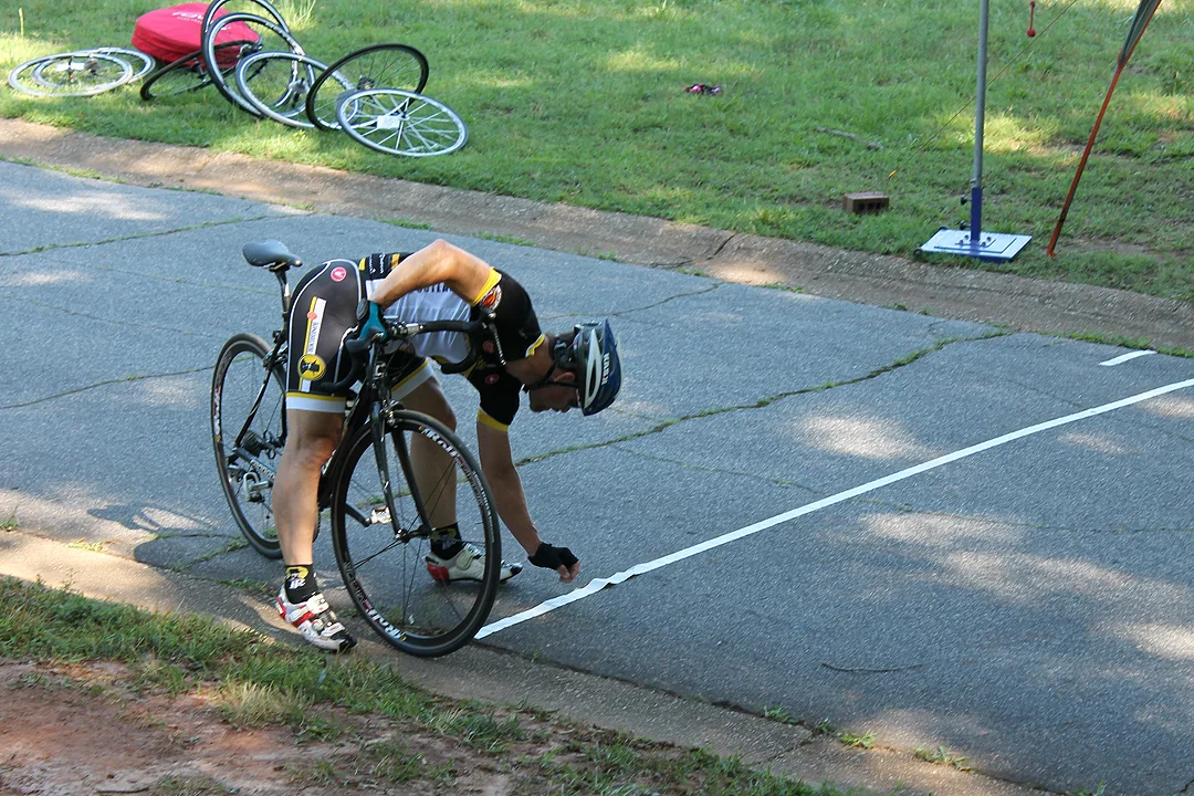 A lone rider straightens the start/finish line.
