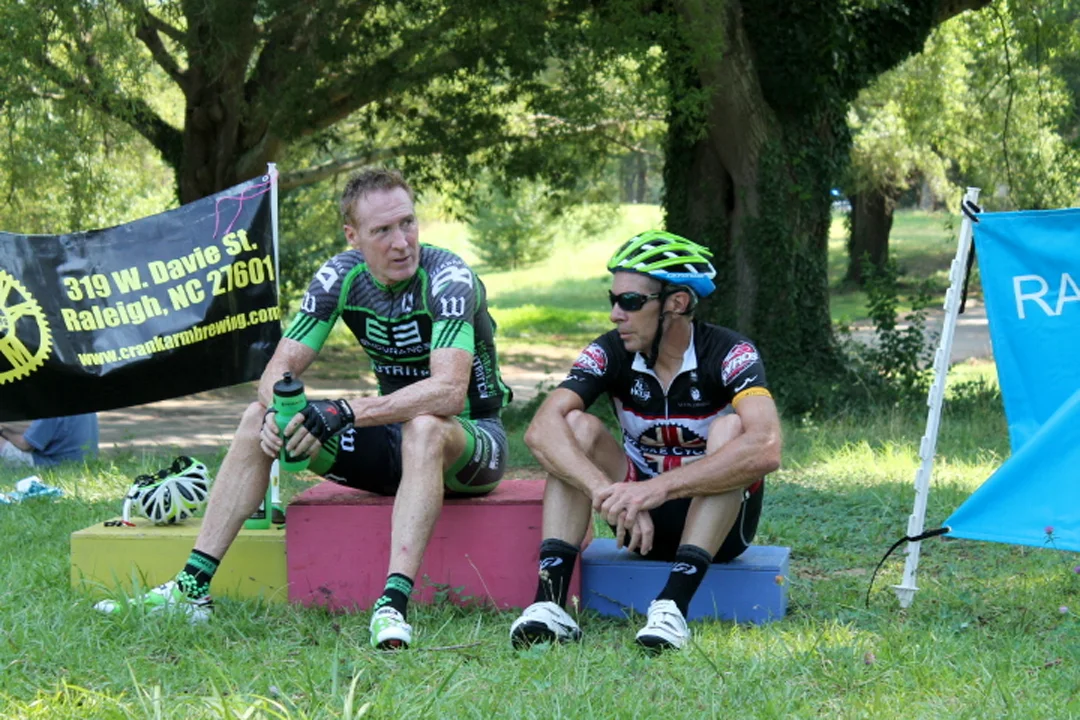 Randy Parker, left, and Ted Hopkins chat on the podium. Parker, of Raleigh, is a three-time national champion.