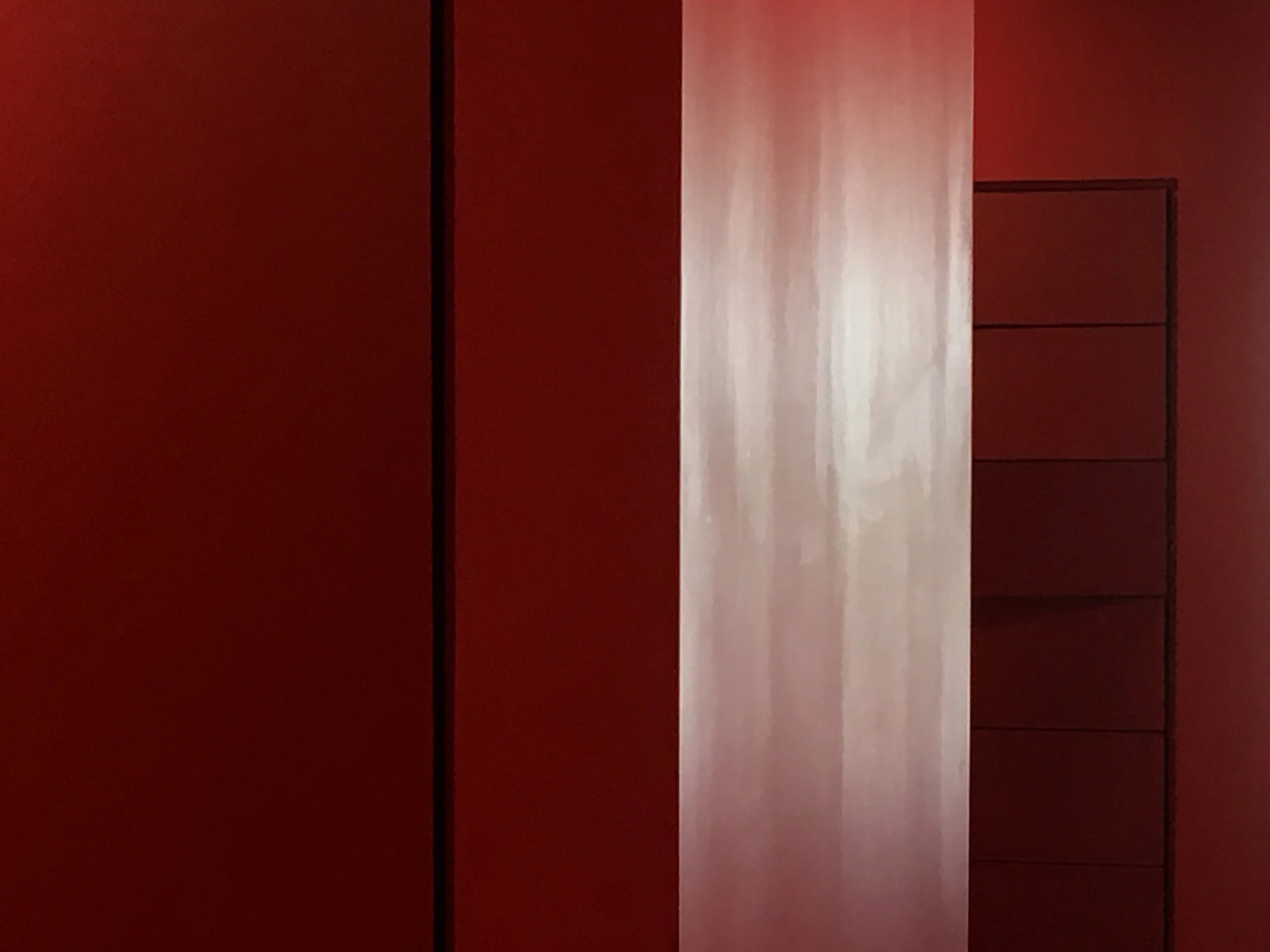 The J. B. Hunt Jr. Library on the N.C. State University campus has been lauded nationally for its design. A hallway with a series of locker nooks is painted Wolfpack red.