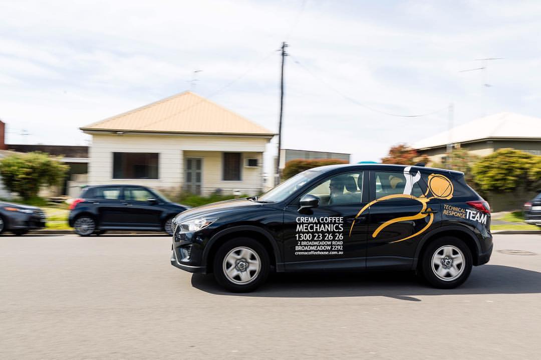 crema coffee training mechanics car.jpg