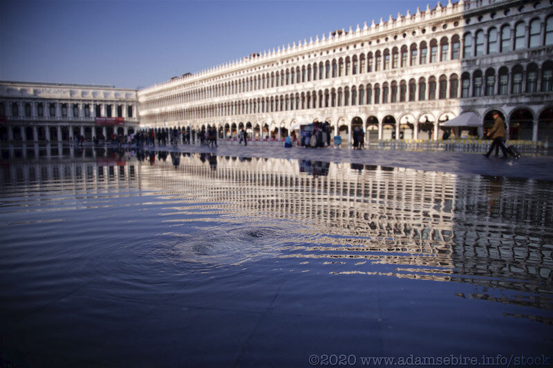 Floodwaters bubble up in Venice