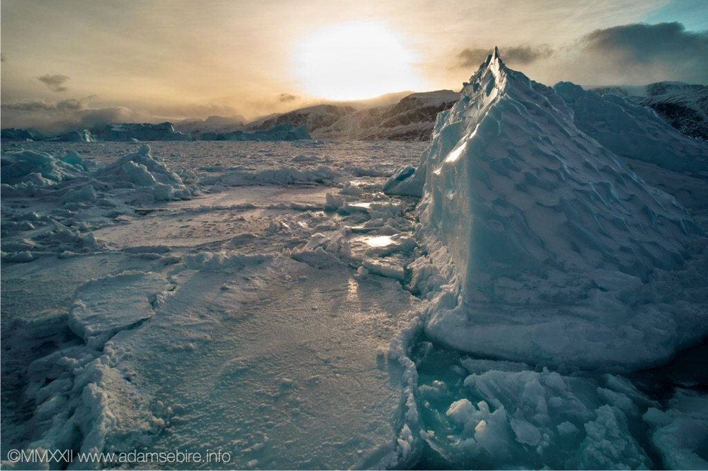 Iceberg melts as sun returns.jpg