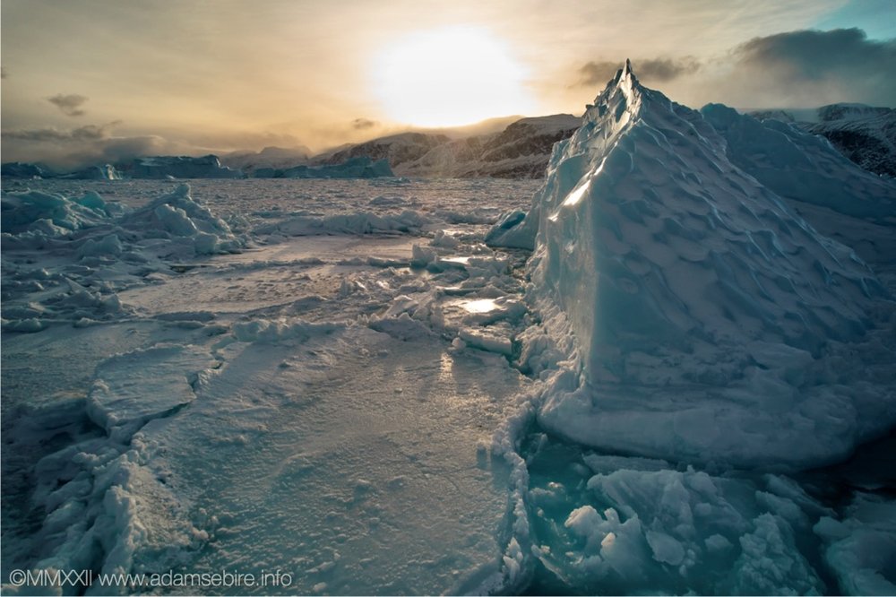 Iceberg melts as sun returns.jpg