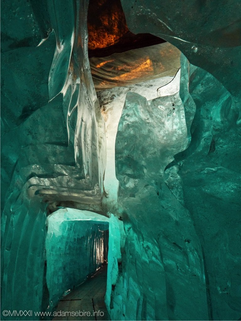 Interior of covered melting Rhone glacier ice grotto .jpg