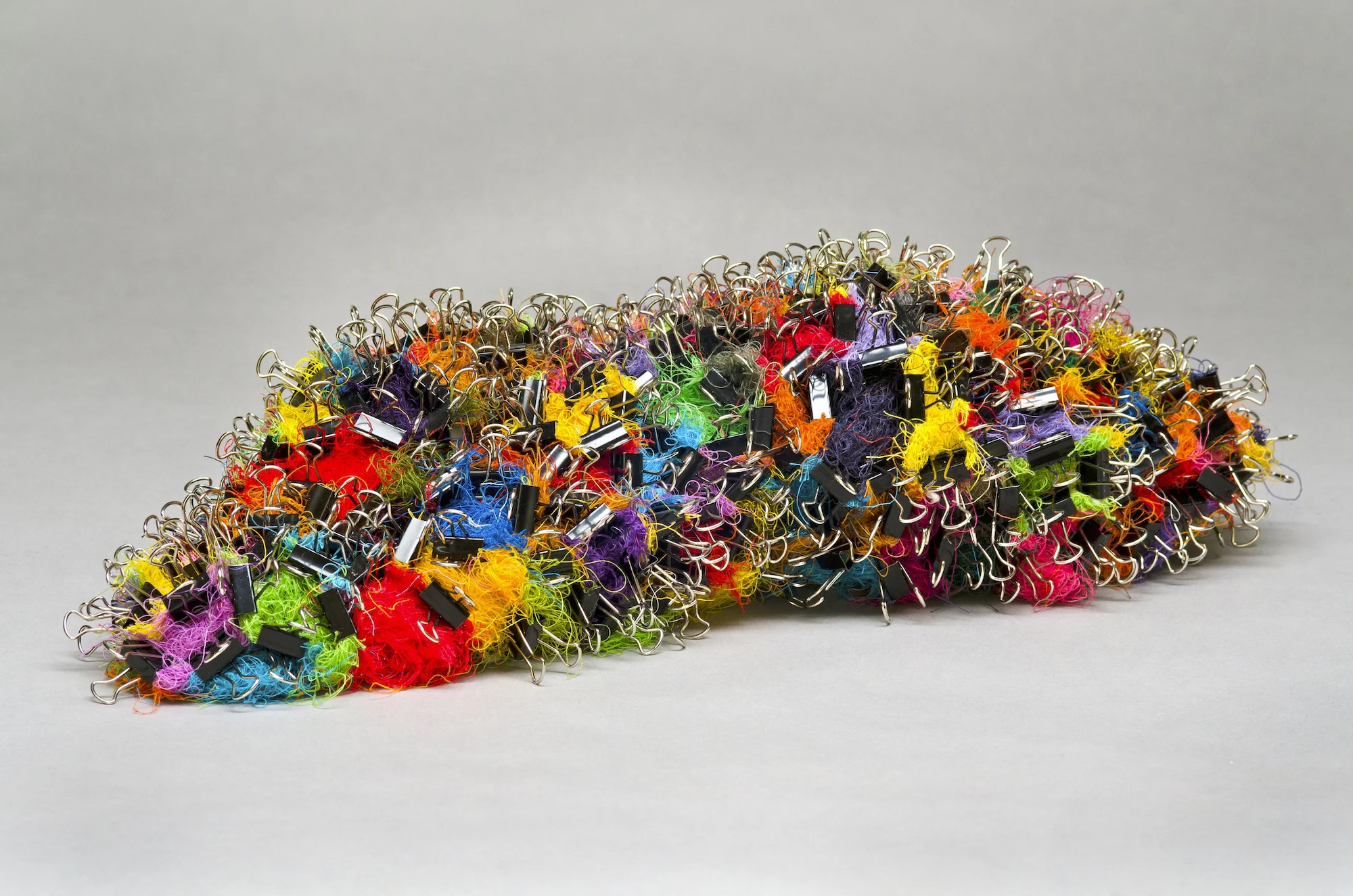 Crawl , 2014 thread, binder clips 6" x 20" x 8"