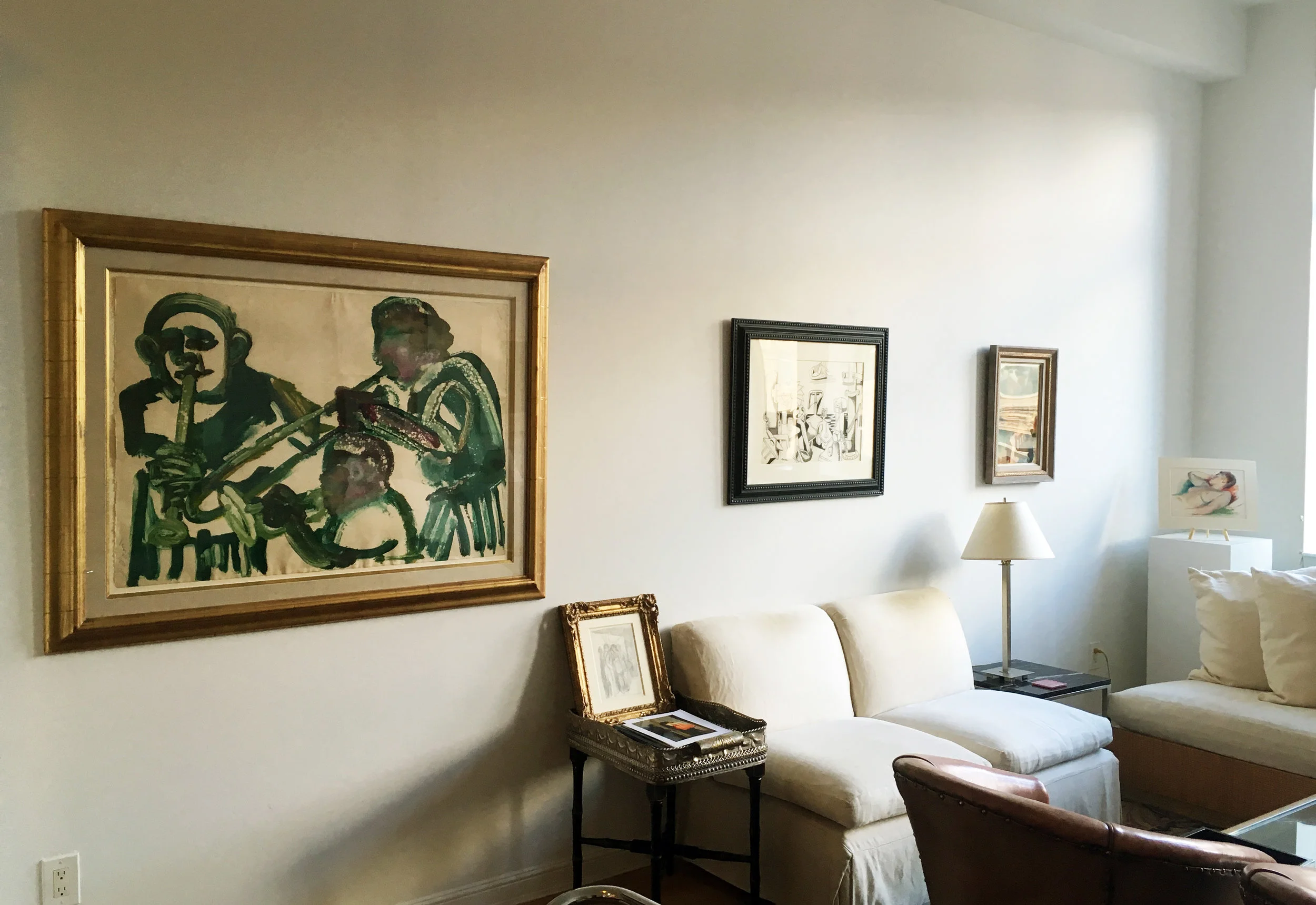 Pictured (left to right): Romare Bearden, Jazz Trio (1986'-’87); Jan Matulka, Cape Ann Still Life (ca. 1929); George Grosz, City Scene (1933); Guy Pene du Bois, Stephanie (1941)