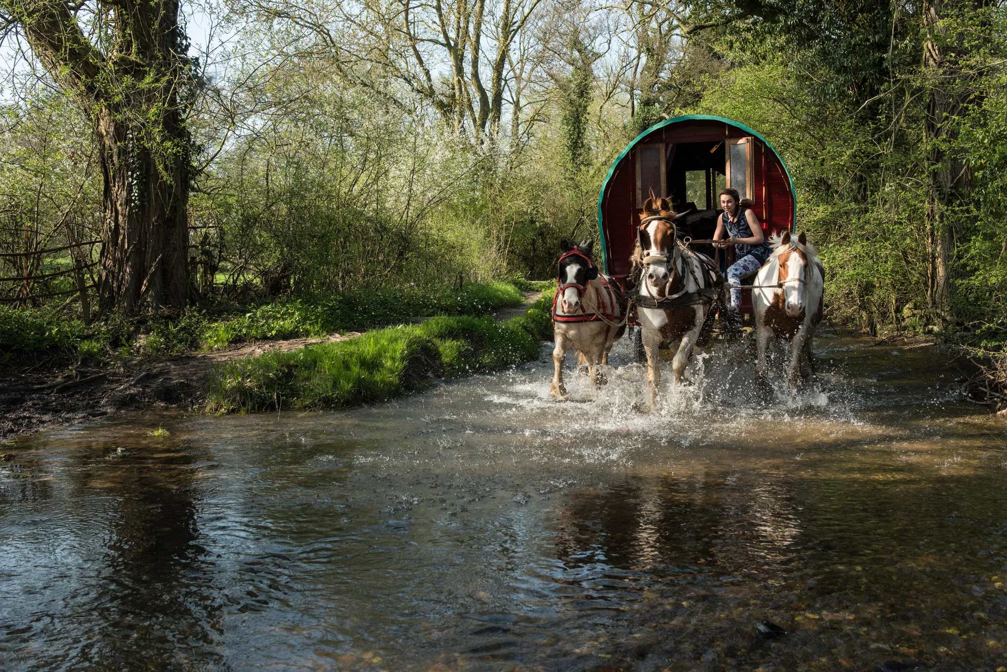 Bryony rides through Brookhouse Ford, Preston Bagot, England, on the way to the Beltane Bash 2018