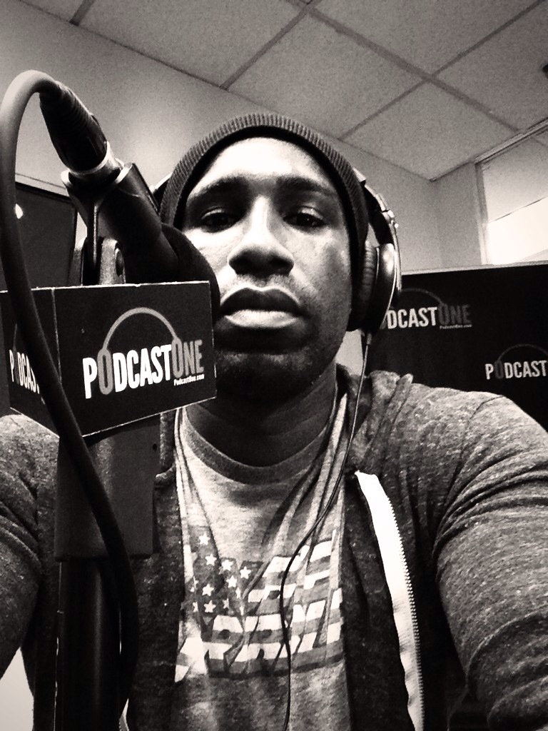 Speak into the mic! My first appearance on PodCastOne. Unlike TV, you can dress down for Radio.