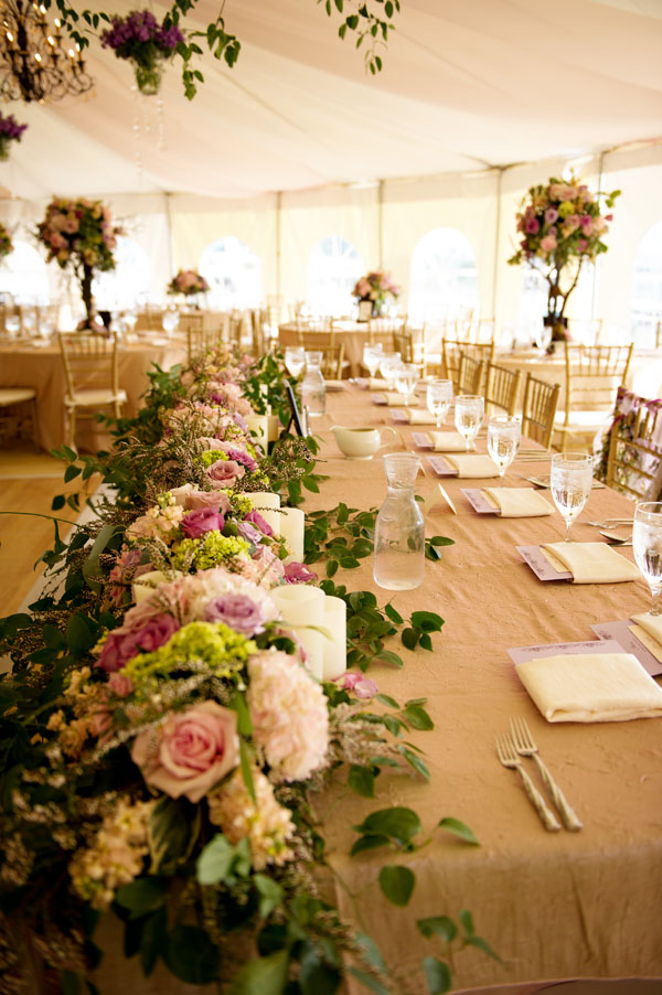 The Flower House - head table with flower garland.jpg