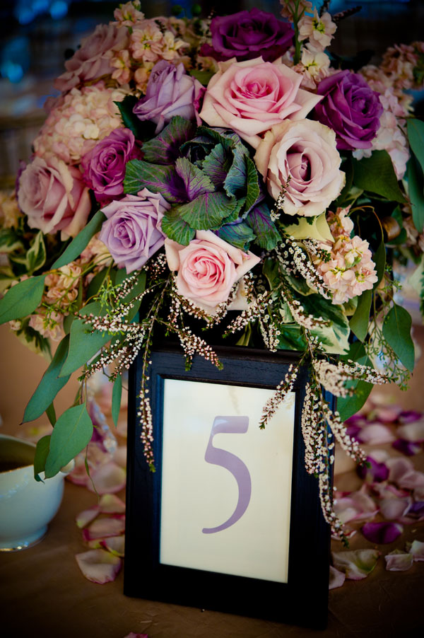 The Flower House - Centerpiece with pink and lavender roses.jpg