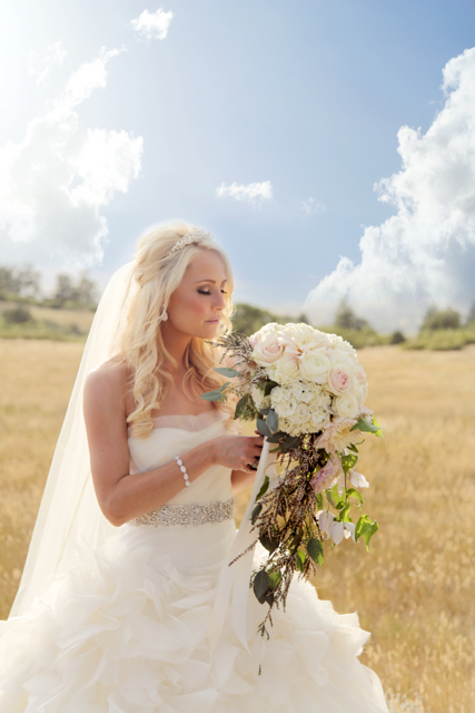 The Flower House Denver - Bride with White cascading bouquet of white flowers.jpg