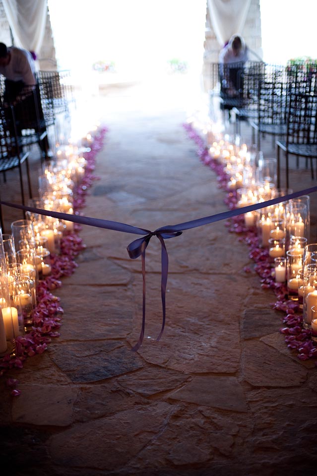 candles and petals lining the ceremony aisle.jpg
