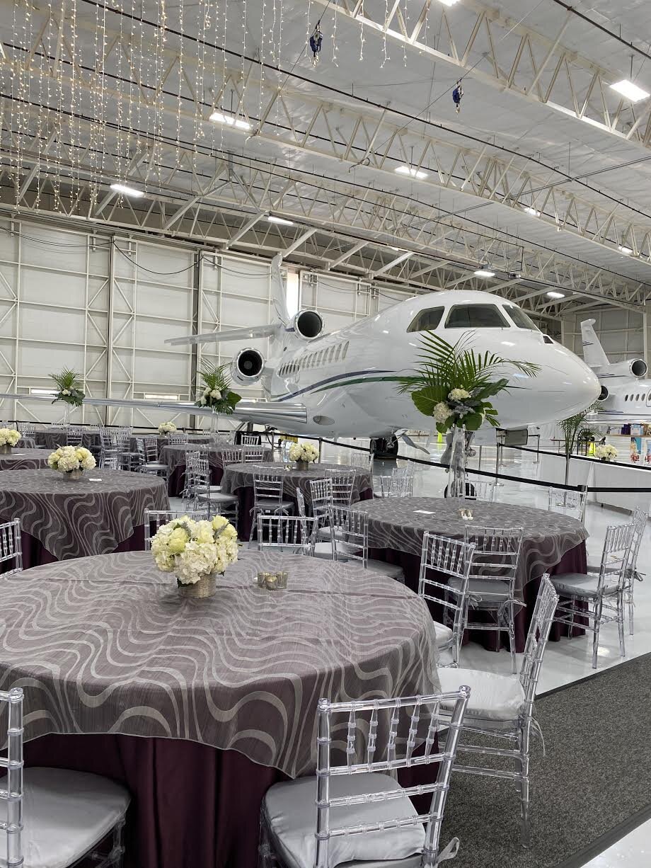 party in an airport hanger - flowers by flower house denver.jpg