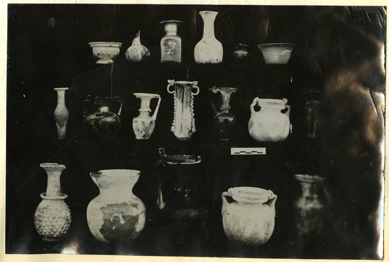 Several glass items found in Tomb 295, in the Northern Cemetery.
