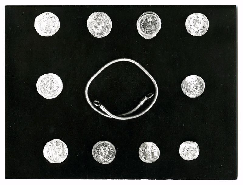 Photograph of the bracelet and gold coins found from the hoard in the Monastery.