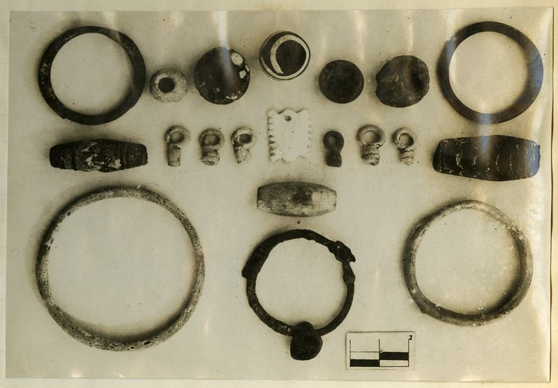 Beads, bracelets, and ivory pendants from Tomb 295.