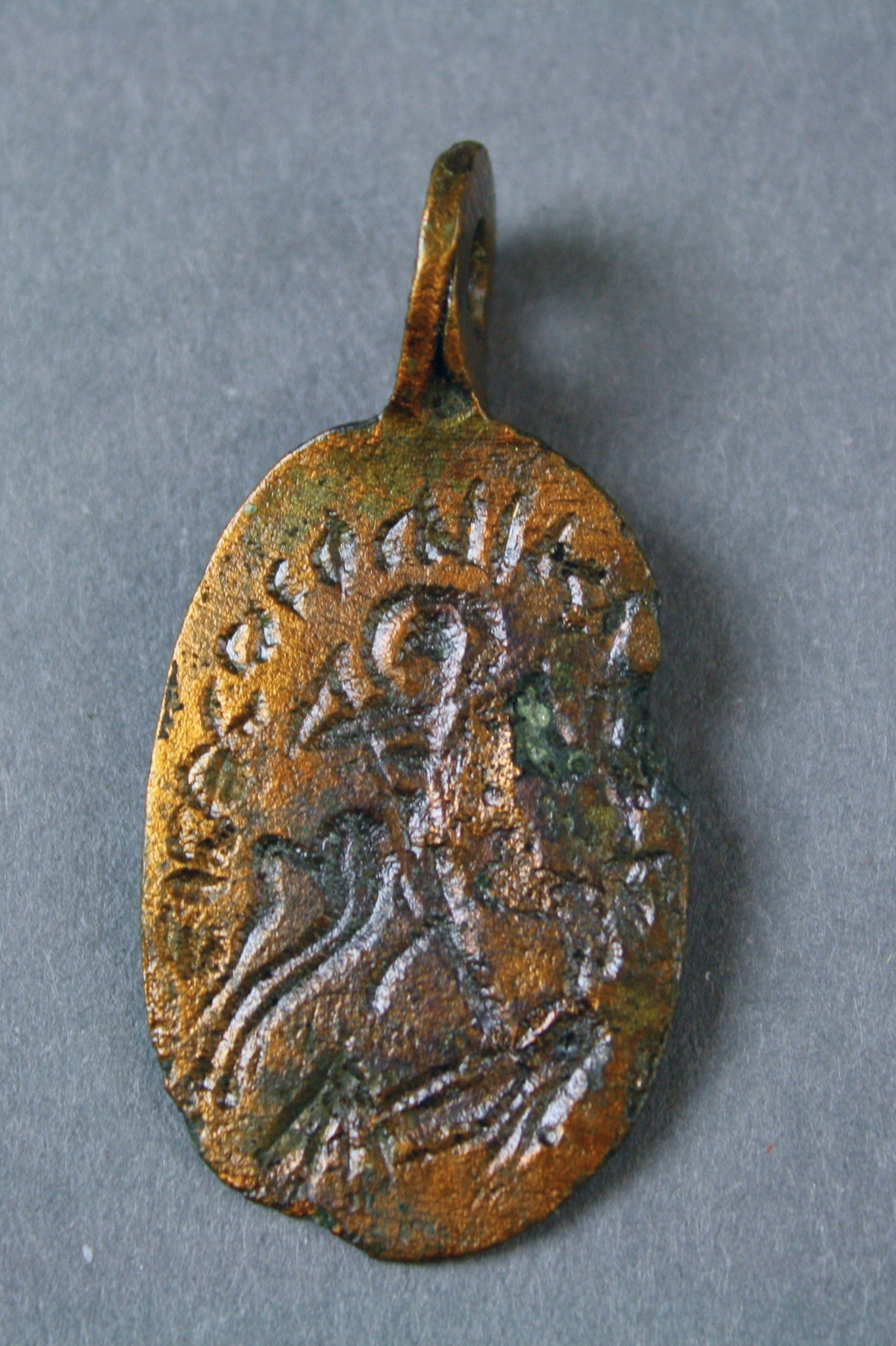 Obverse depicting the rider saint slaying a female demon.