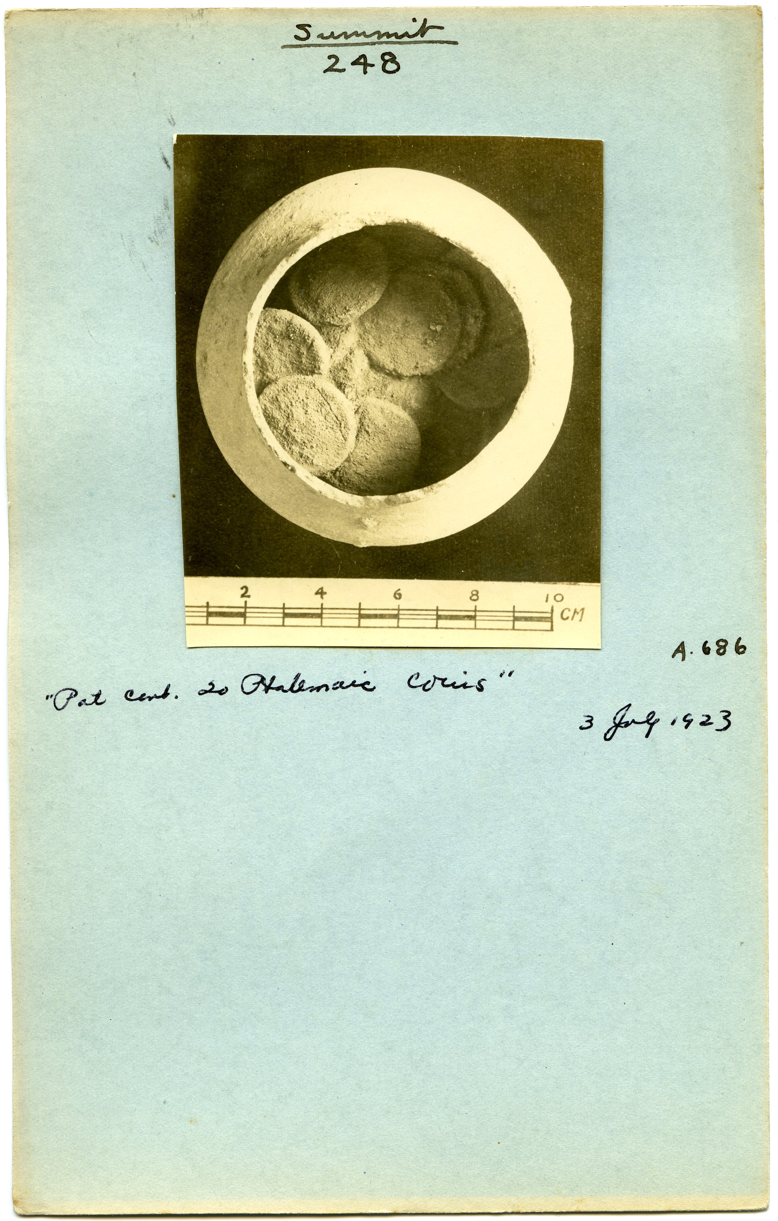 A pot of coins discovered on the Tel by Clarence Fisher's 1923 campaign.