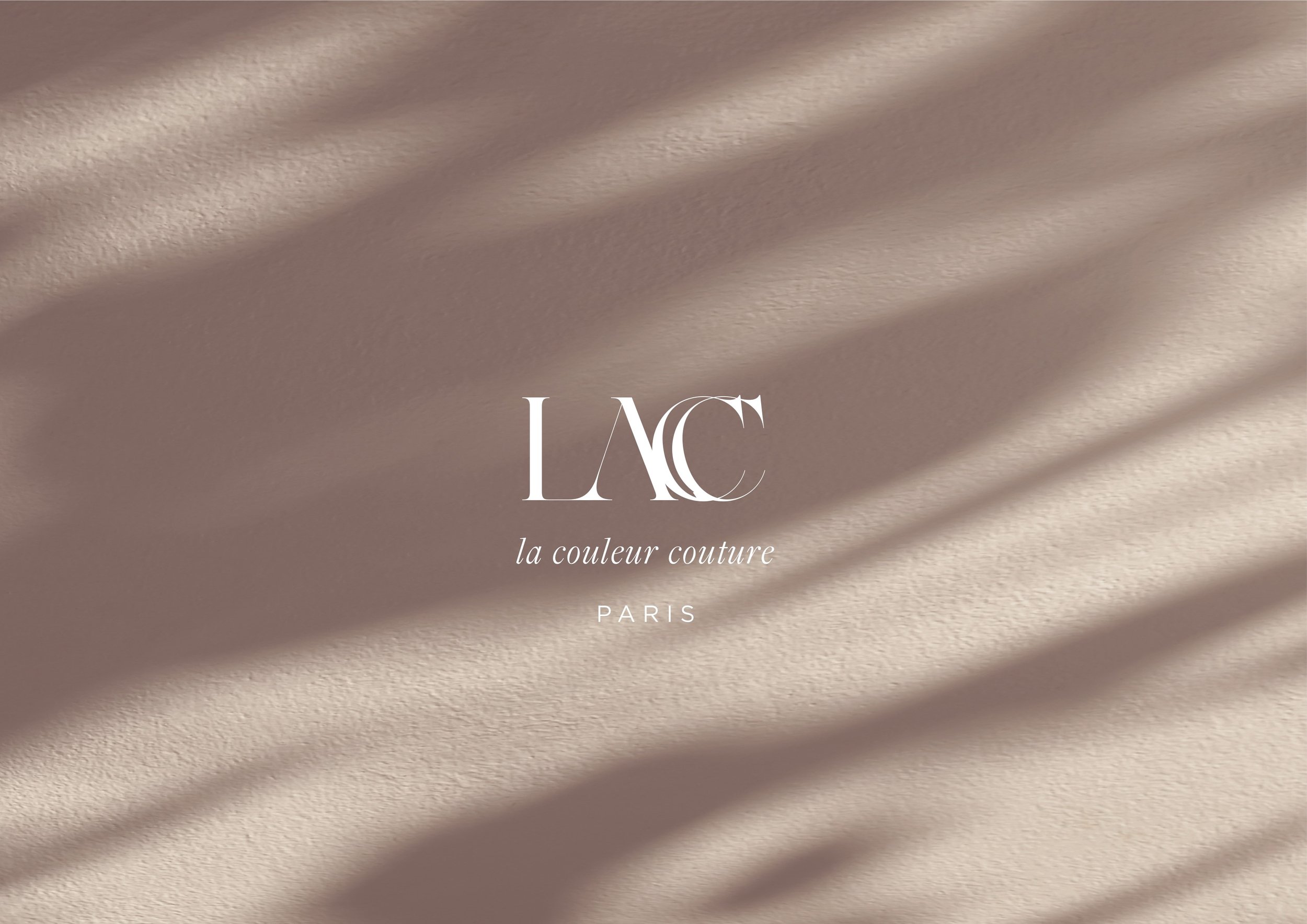Elegant beige fabric with shadow patterns and a white logo reading 'LAC' with the tagline 'la couleur couture' and 'Paris' below.