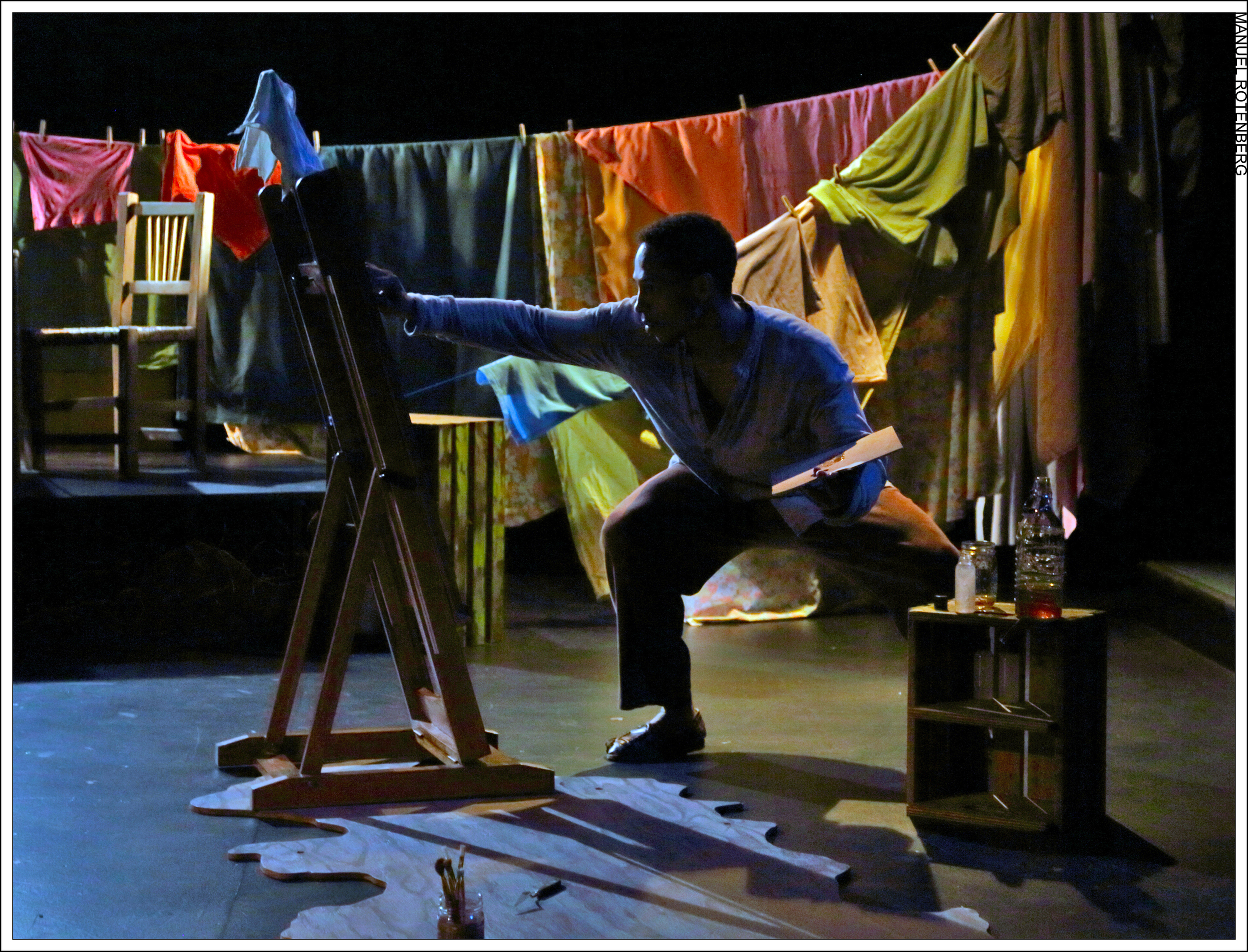 Edwin (Gerard Joseph) is inspired to paint Henri-Max.