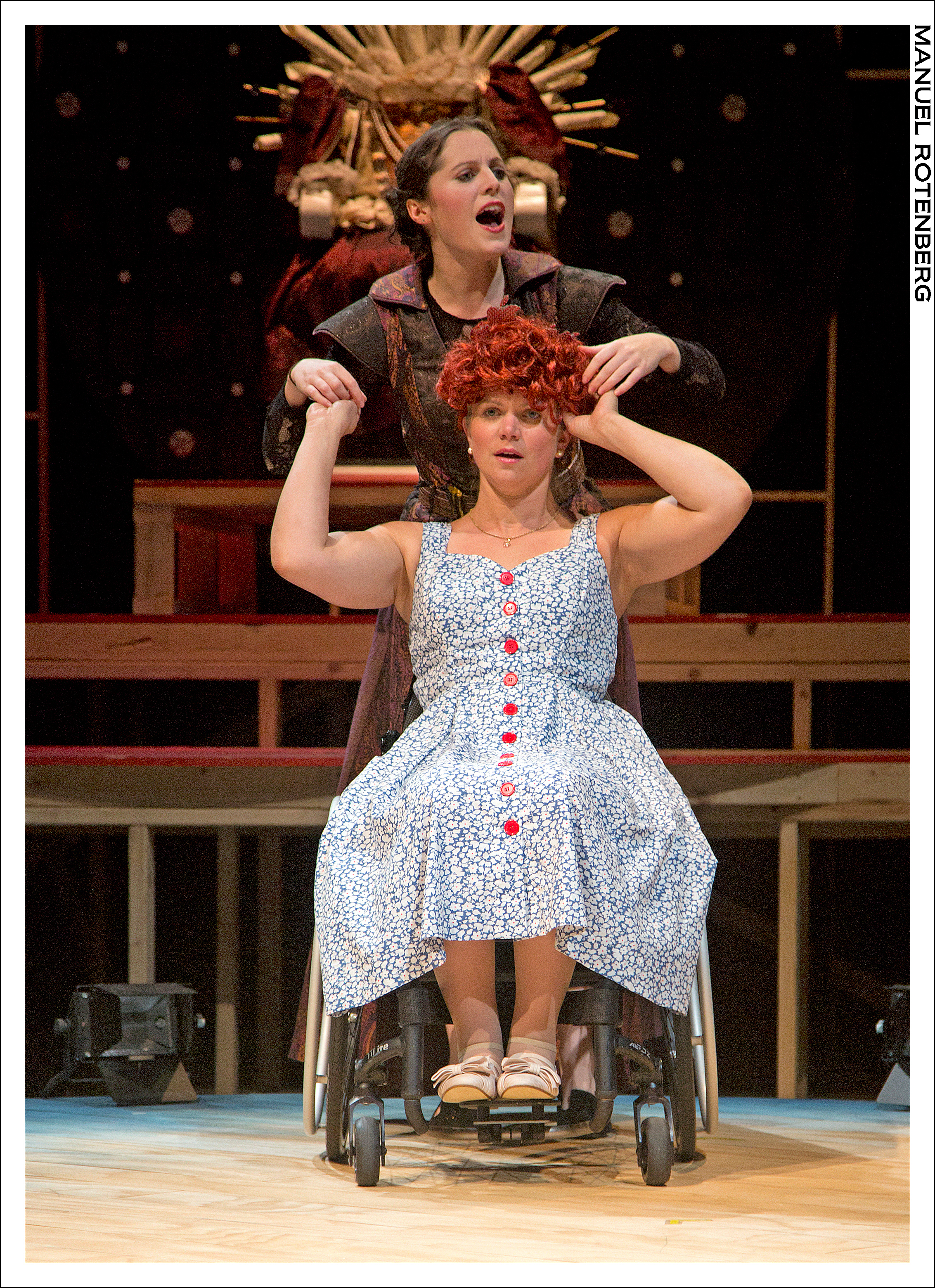 Pata Sola (Hannah Corrigan) dresses Regan Linton as Queen Elizabeth.