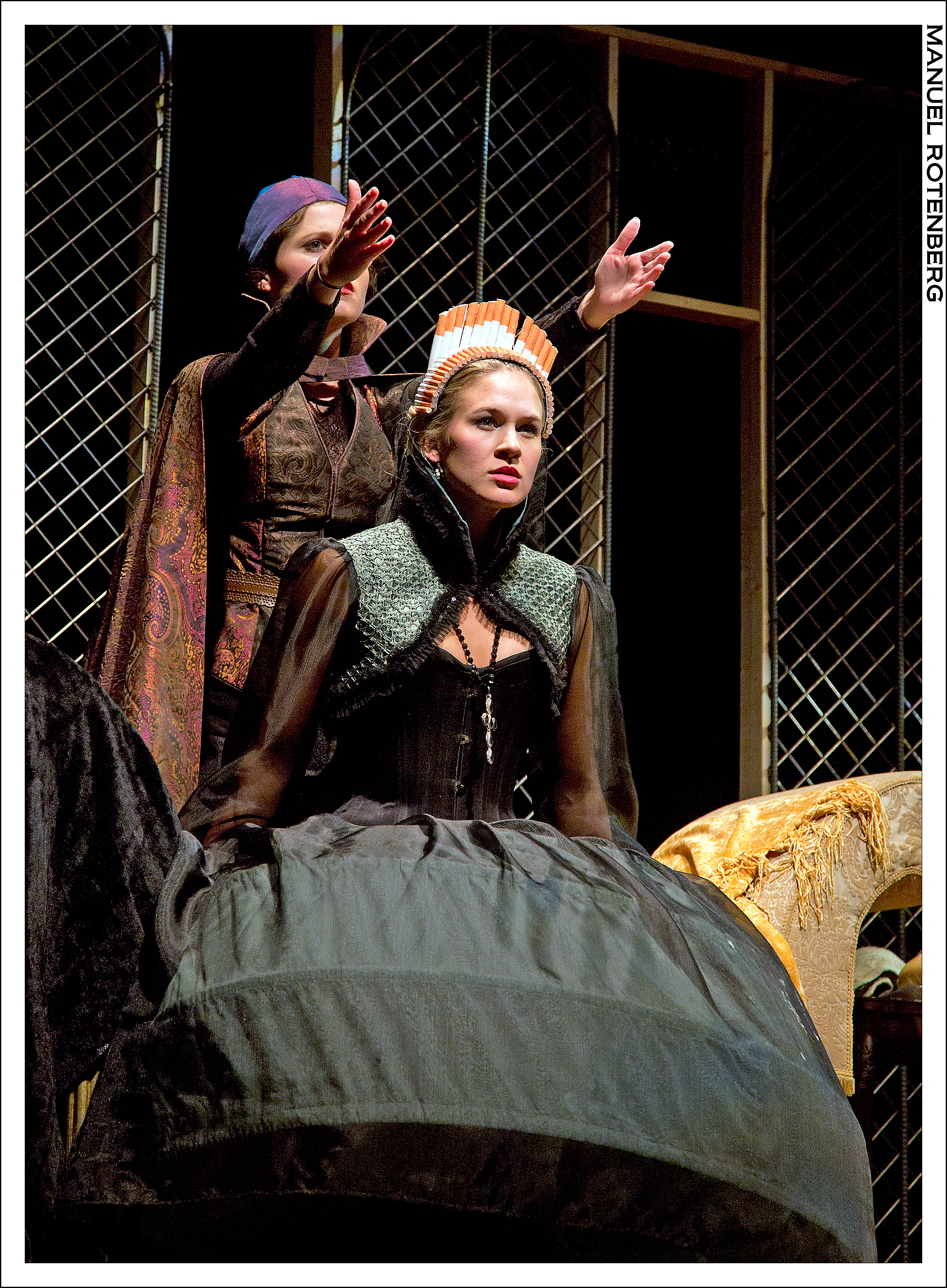 Nostradamus (Hannah Corrigan) shows Queen Catherine of France (Sarah Halford) visions of Mary Queen of Scots.