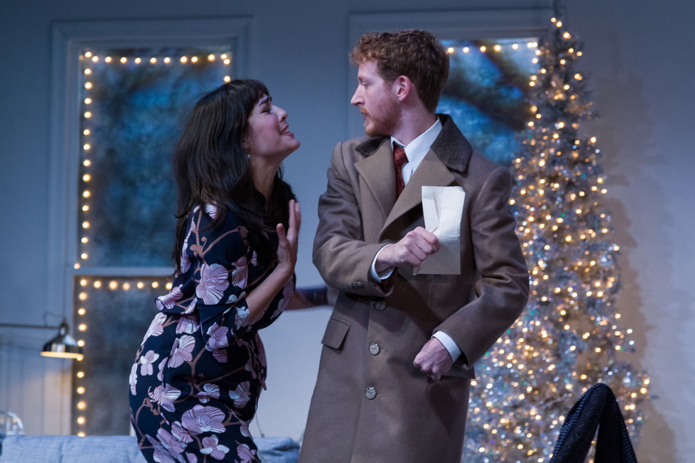 Nora (Kim Blank) begs Krogstad (MacGregor Arney) not to deliver the letter about her forgery to Torvald.