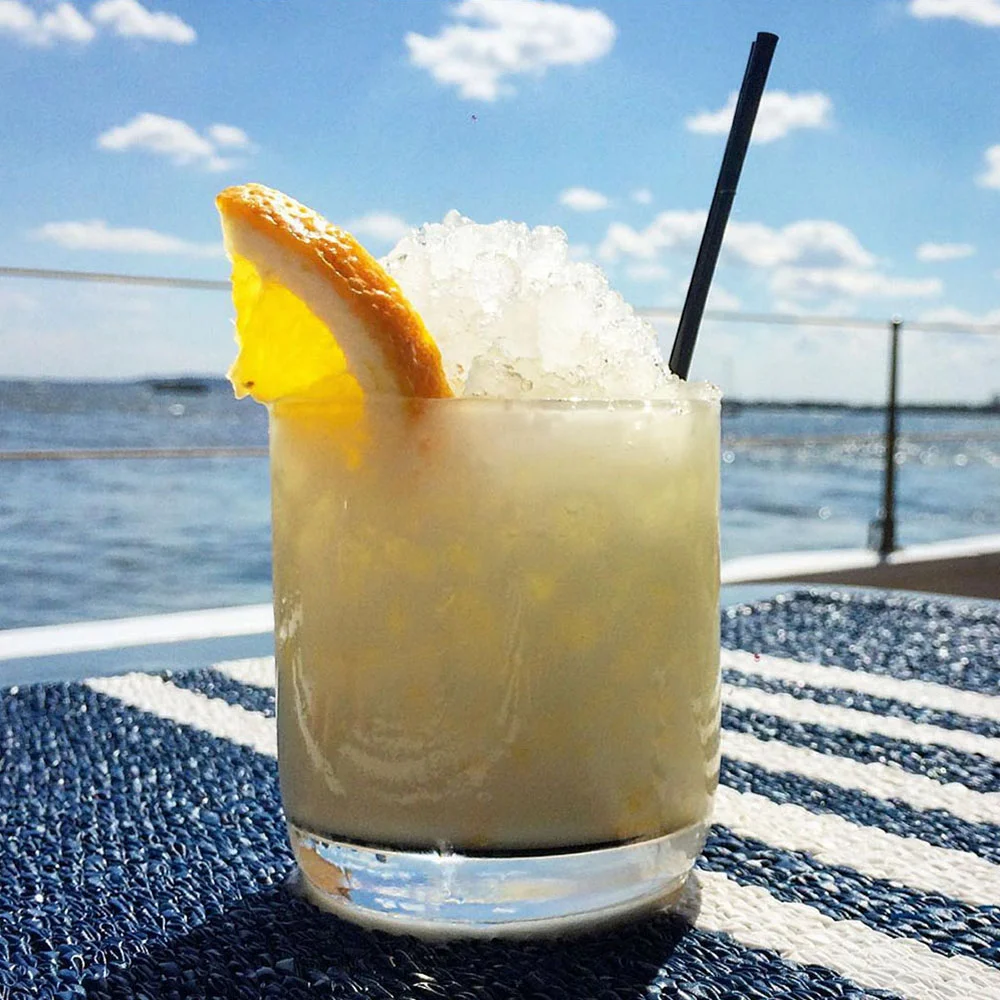 PAINKILLER ~ White Rum, Coconut Cream, Pineapple, Sun