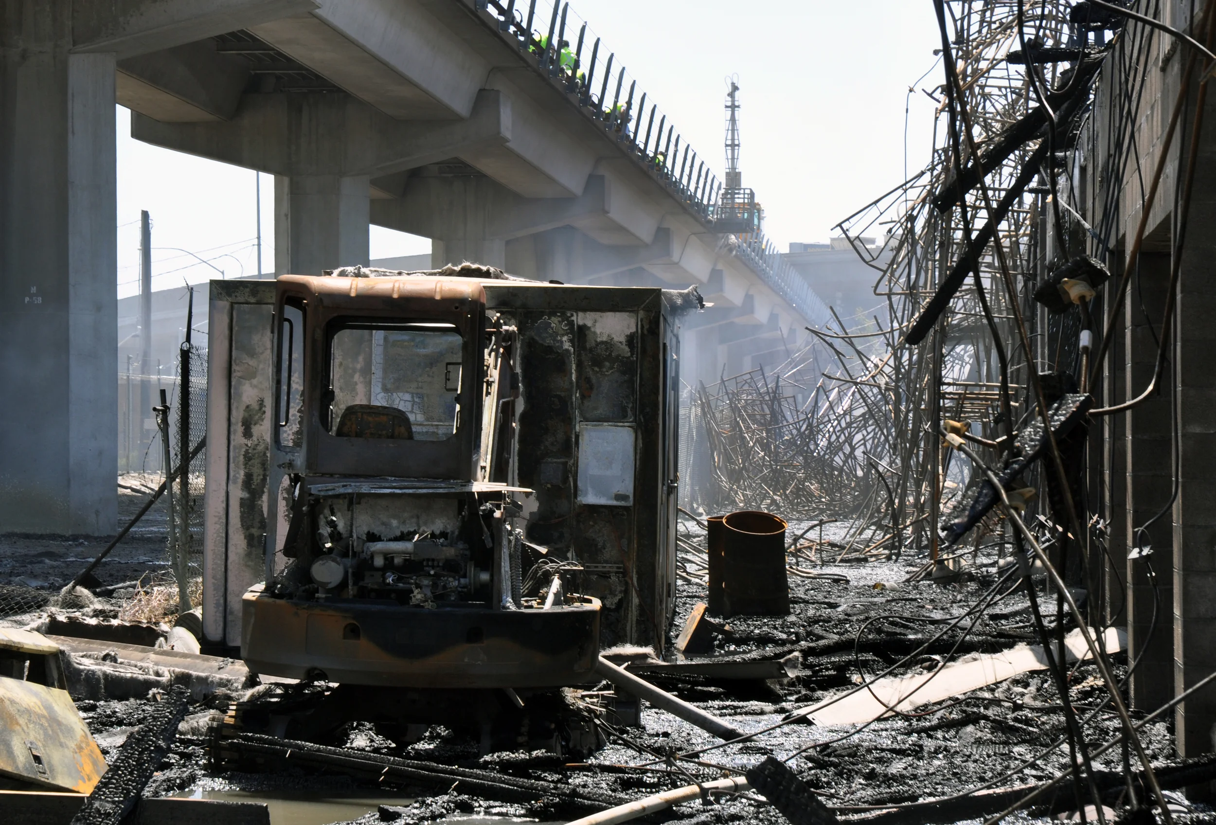  The remains of the fire that consumed a construction site underneath the West Oakland Bart Station in Oakland, Calif., on Thursday, June 14, 2012.&nbsp; 