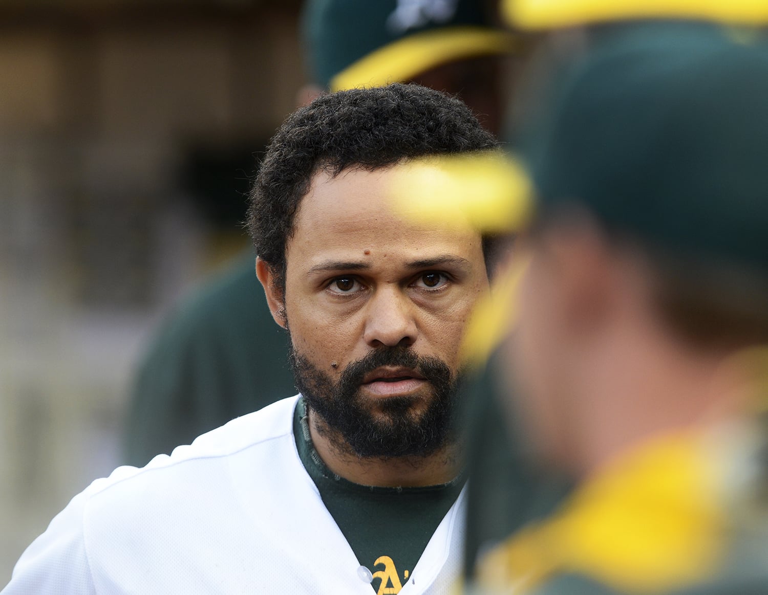  Oakland A's center fielder Coco Crisp (4) walks through the dugout in the third inning after being left on base against the San Francisco Giants at the O.co Coliseum in Oakland, Calif., on Monday, July 7, 2014. (Godofredo Vasquez/SFBay) 