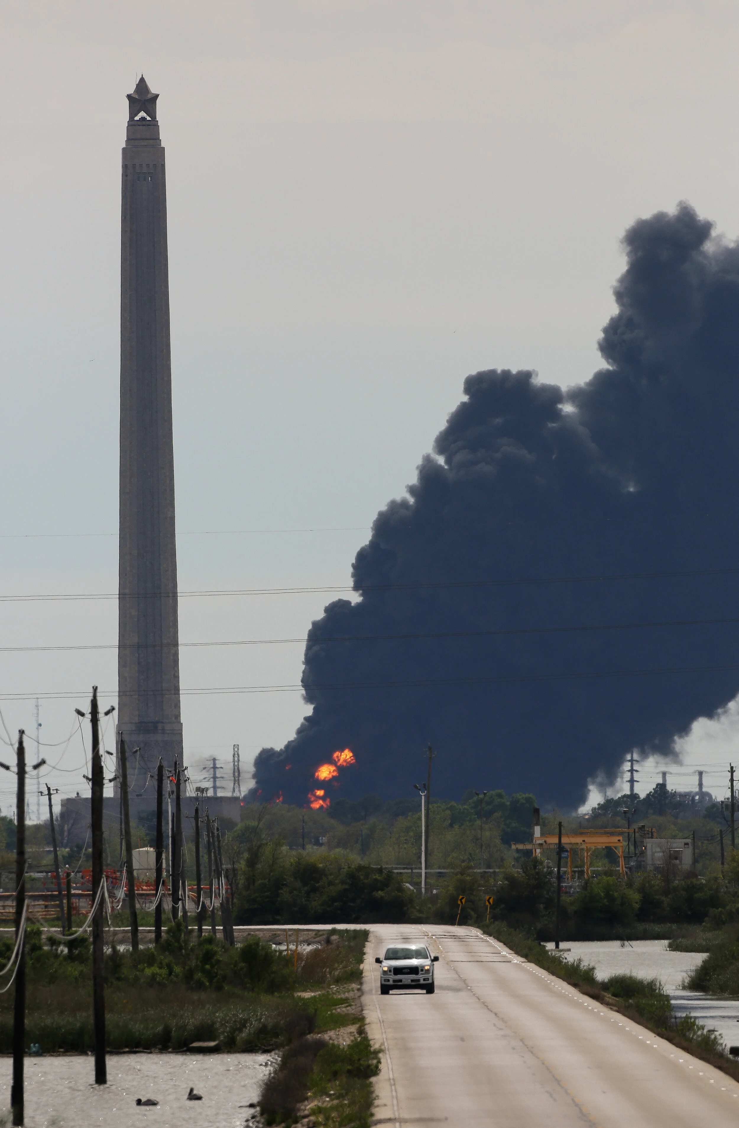  A view of the petrochemical fire at the Intercontinental Terminals Company, which is less than two miles southwest from the San Jacinto Memorial Monday, March 18, 2019, in Baytown, Texas. 
