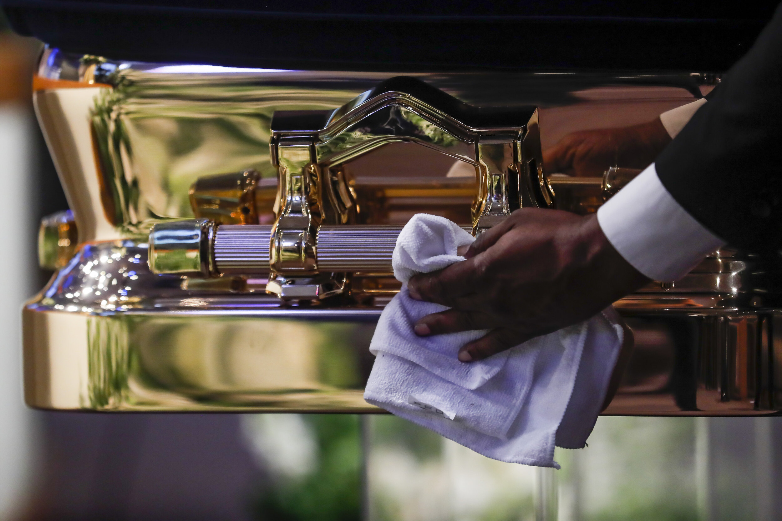  The casket is polished before the funeral for George Floyd at The Fountain of Praise church on Tuesday, June 9, 2020, in Houston, Texas. Floyd died while in custody of the Minneapolis Police Department, after officer Derek Chauvin knelt on his neck 