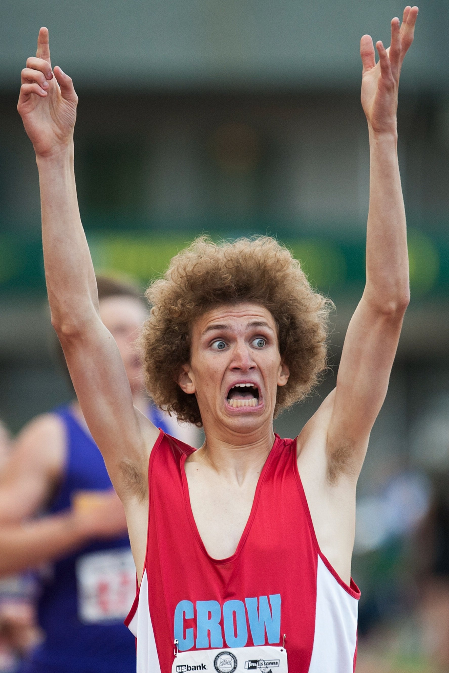  Crow High School athlete Kaelan Recca celebrates after winning the 2A boys 800-meter run during the state championships at Hayward Field on Friday, May 22, 2015, in Eugene, Oregon.  
